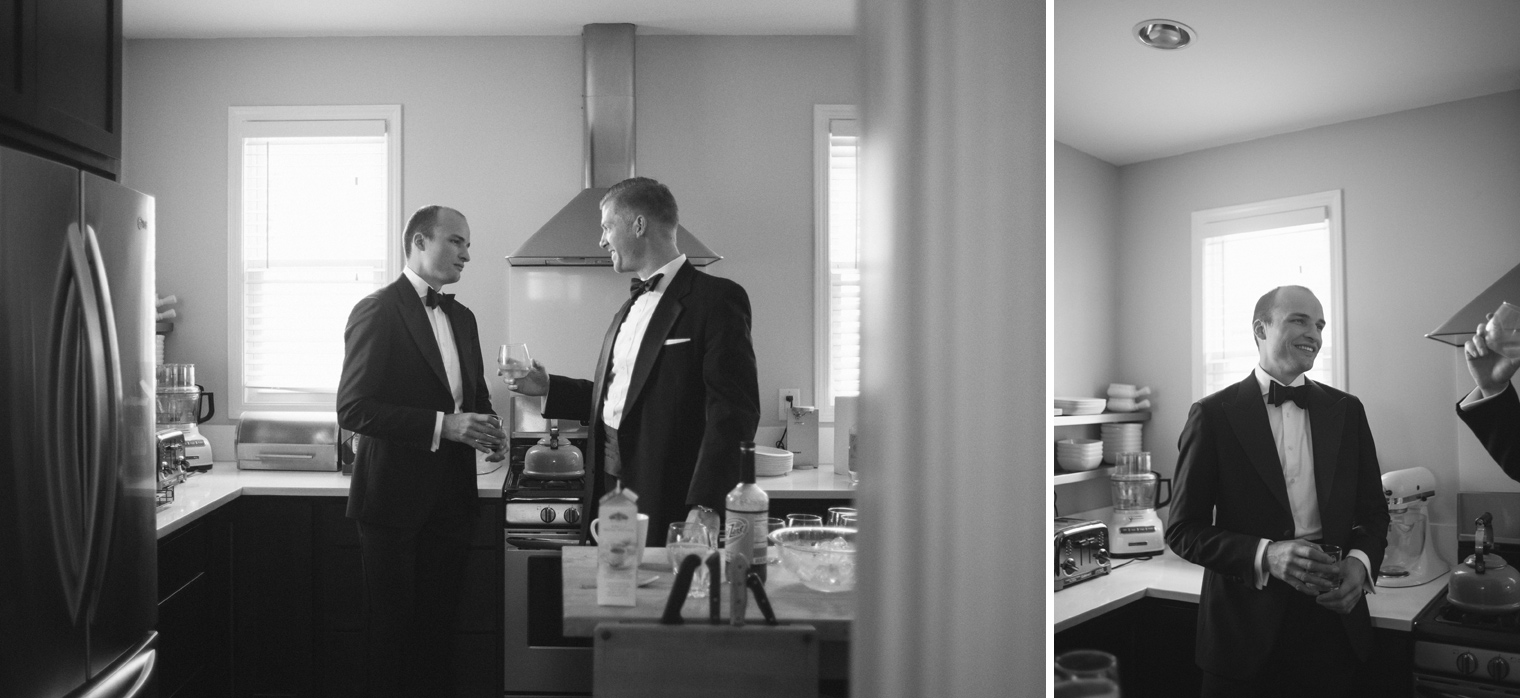 Groom shares a drink with his groomsmen before his Detroit wedding.