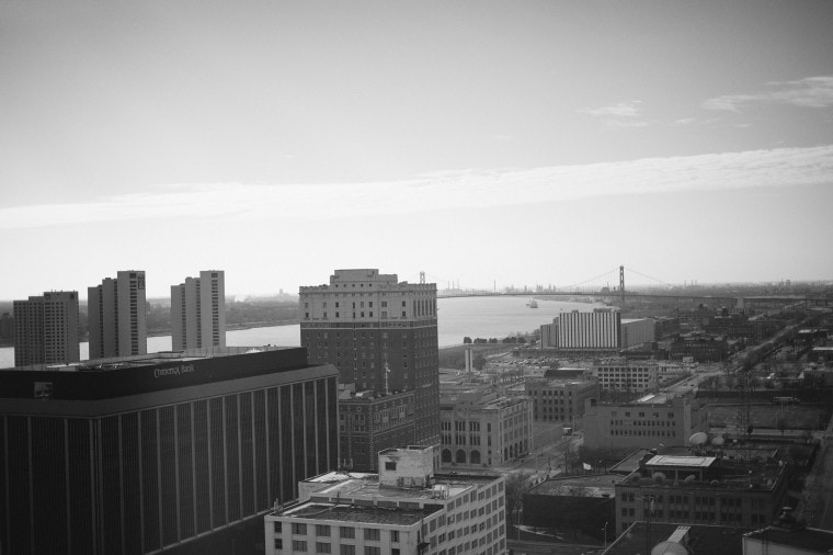 A black and white image of the Detroit Skyline by Michigan wedding photographer Heather Jowett.