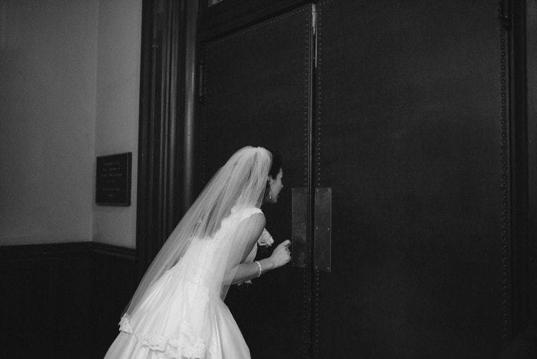 Bride peeking through door
