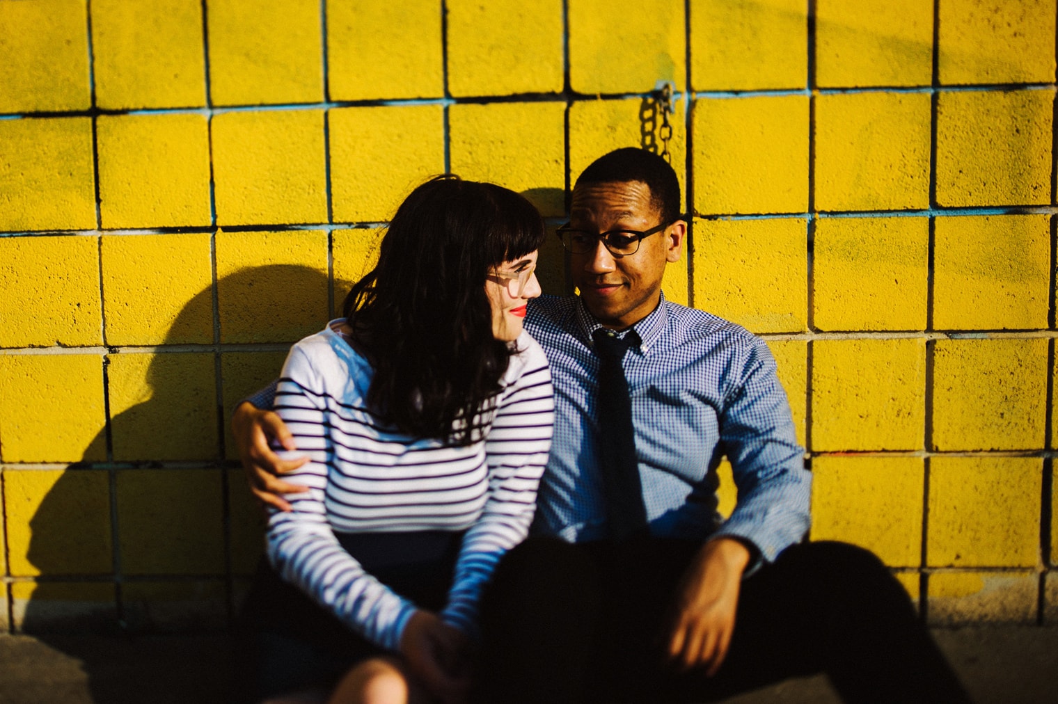 couples portrait with yellow