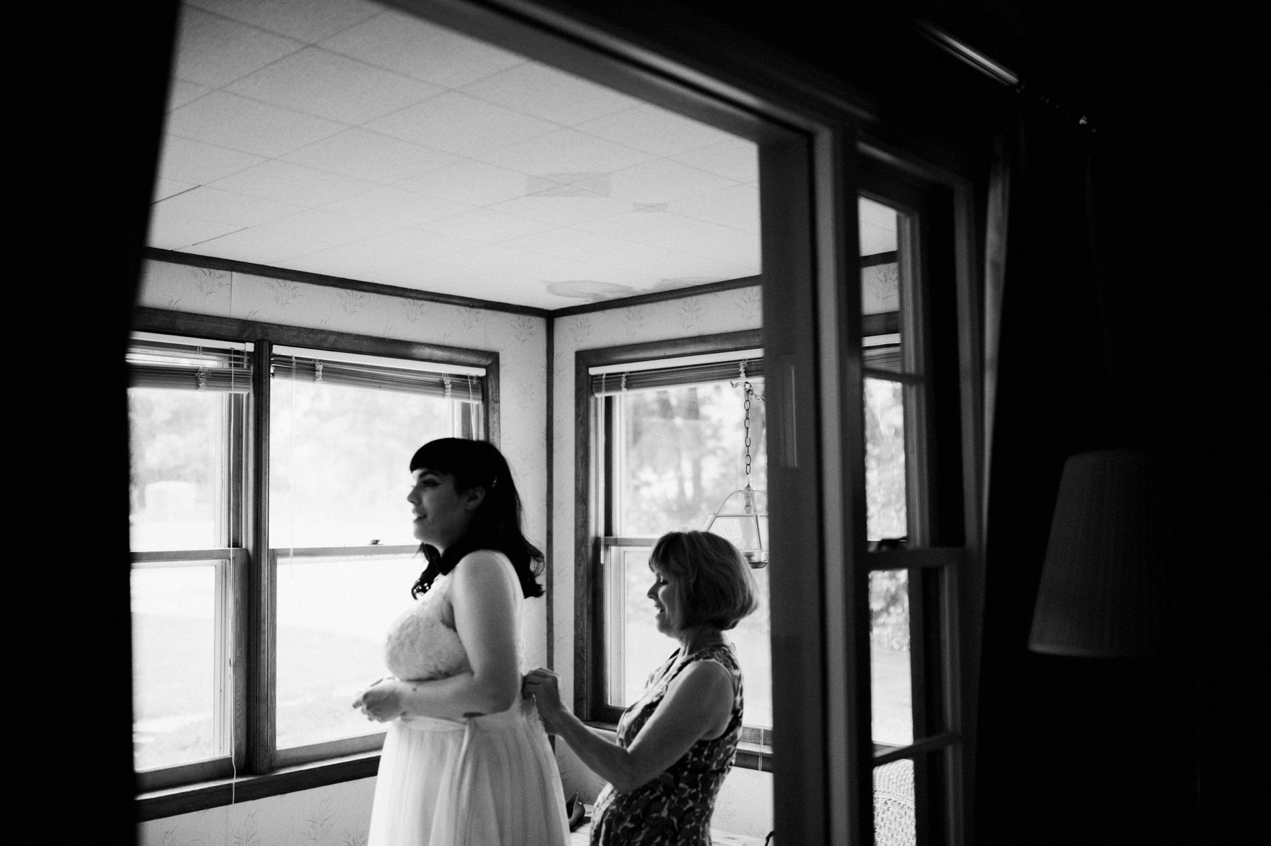 mother and bride getting ready