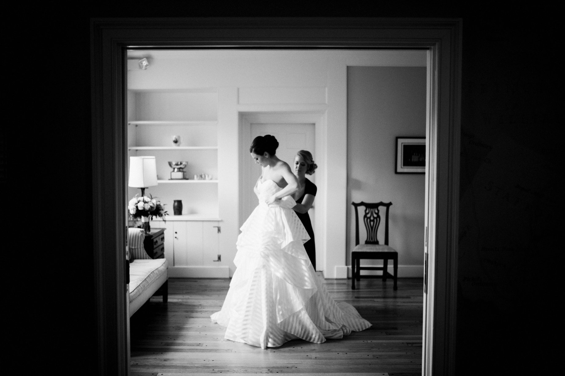 006 bride getting dressed at gunston hall