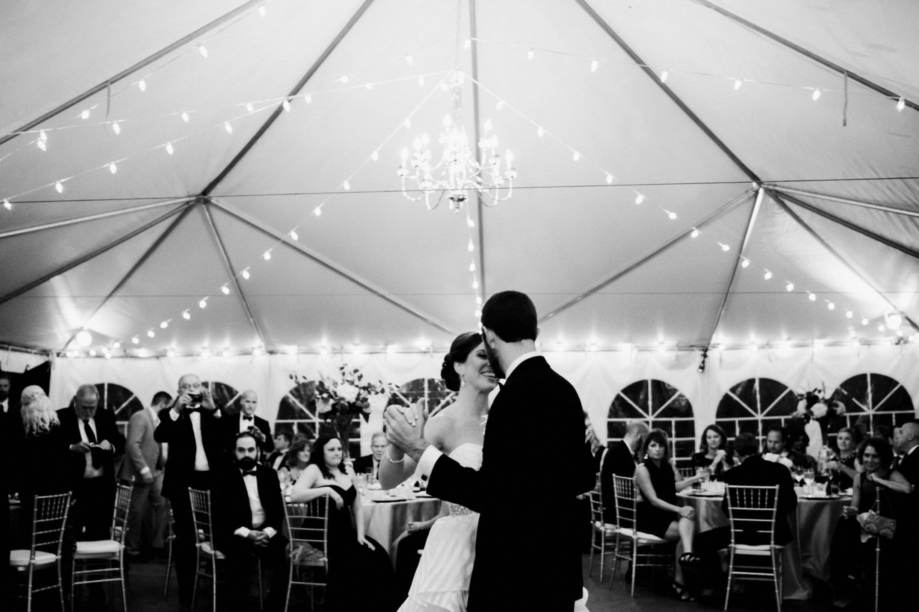 036 bride and groom dance under bistro lights