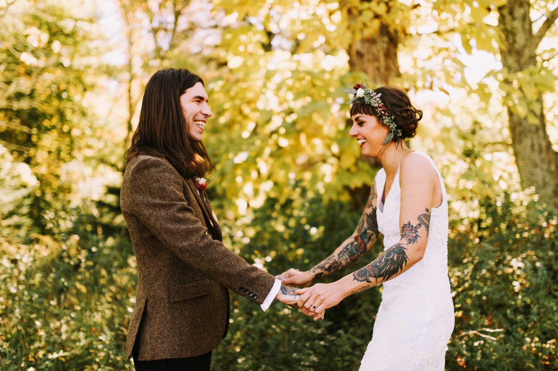 tattooed bride and groom first look