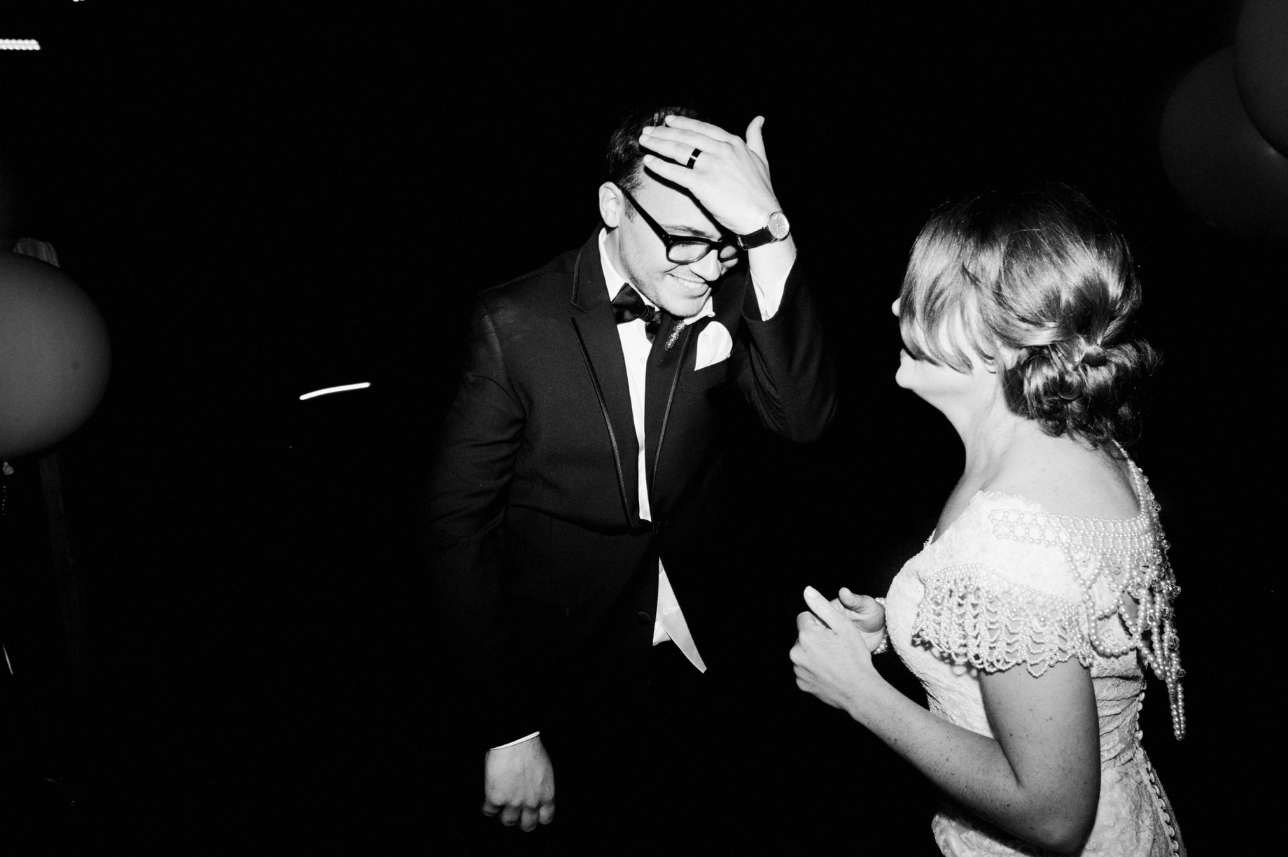 bride and groom dancing