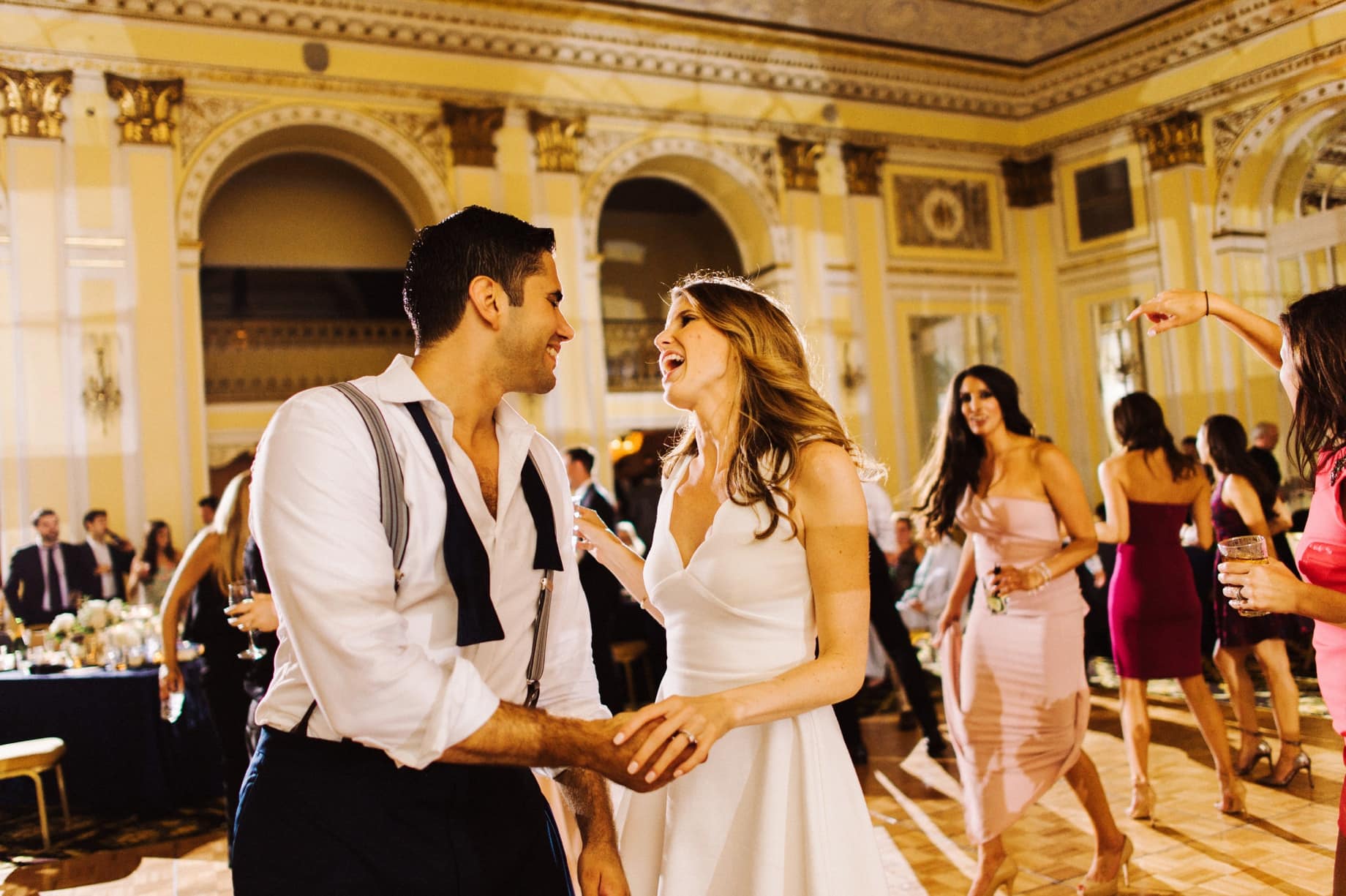 bride and groom dancing