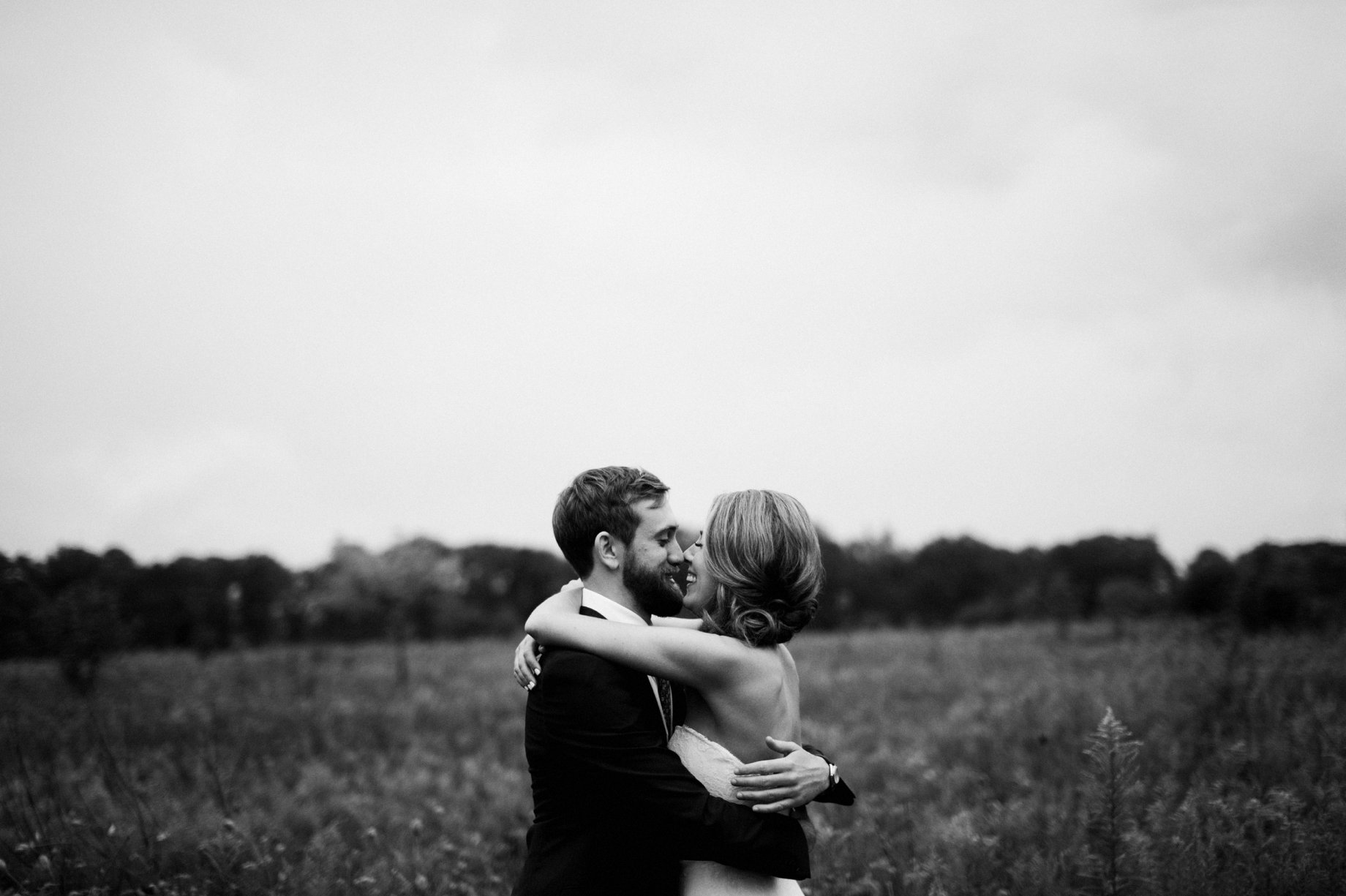 a couple embracing on their wedding day