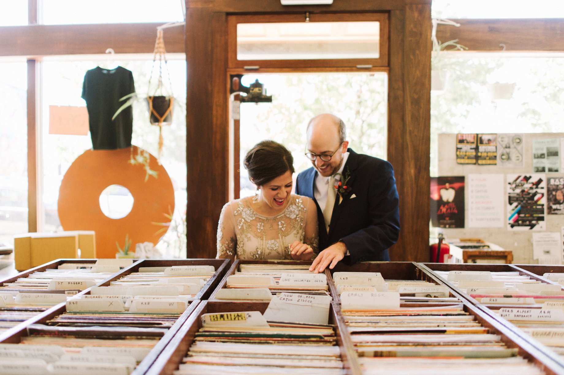 bride and groom recording shopping on their detroit wedding day