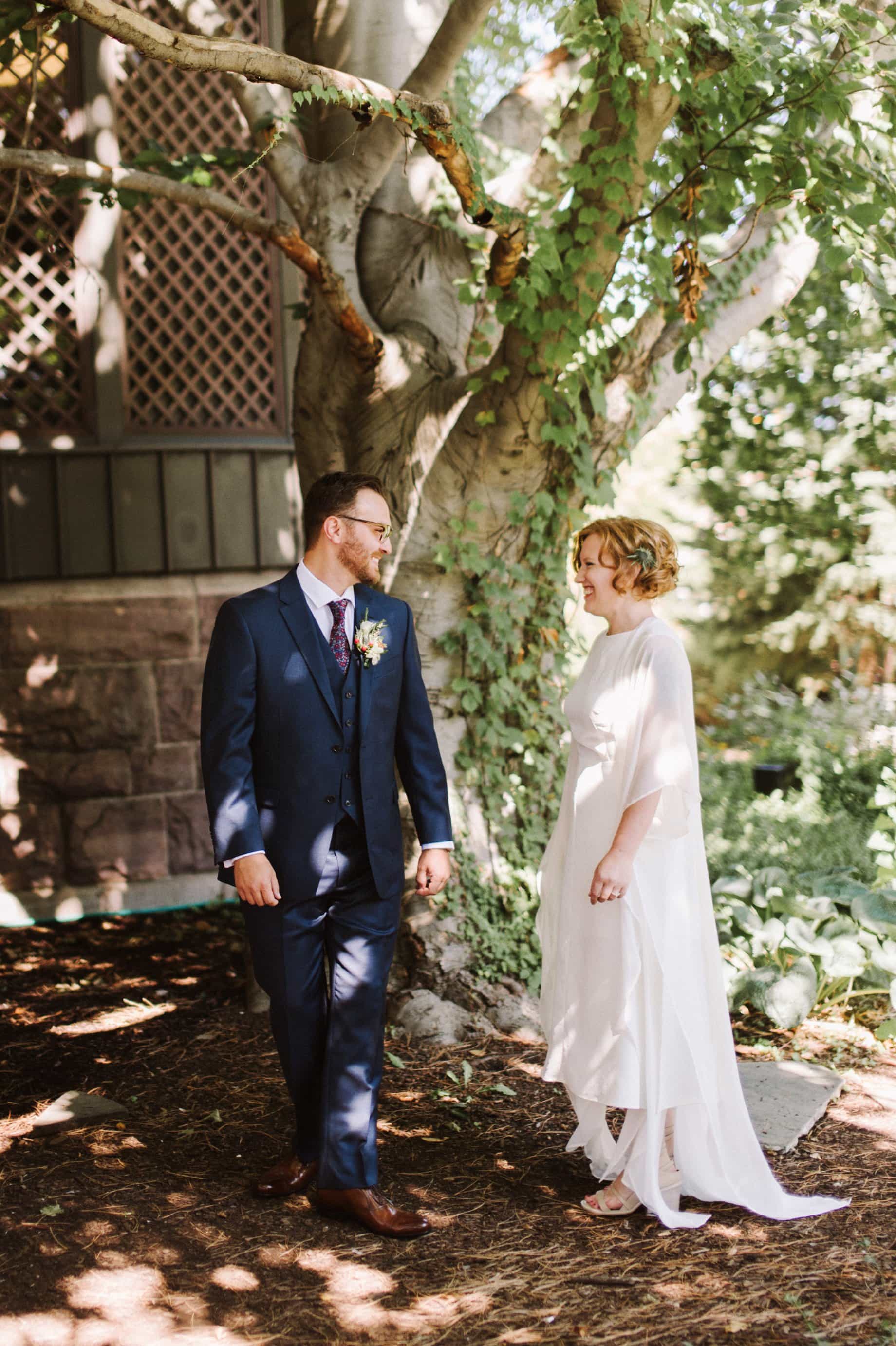 first look in the garden before a wedding at the Whitney in Detroit