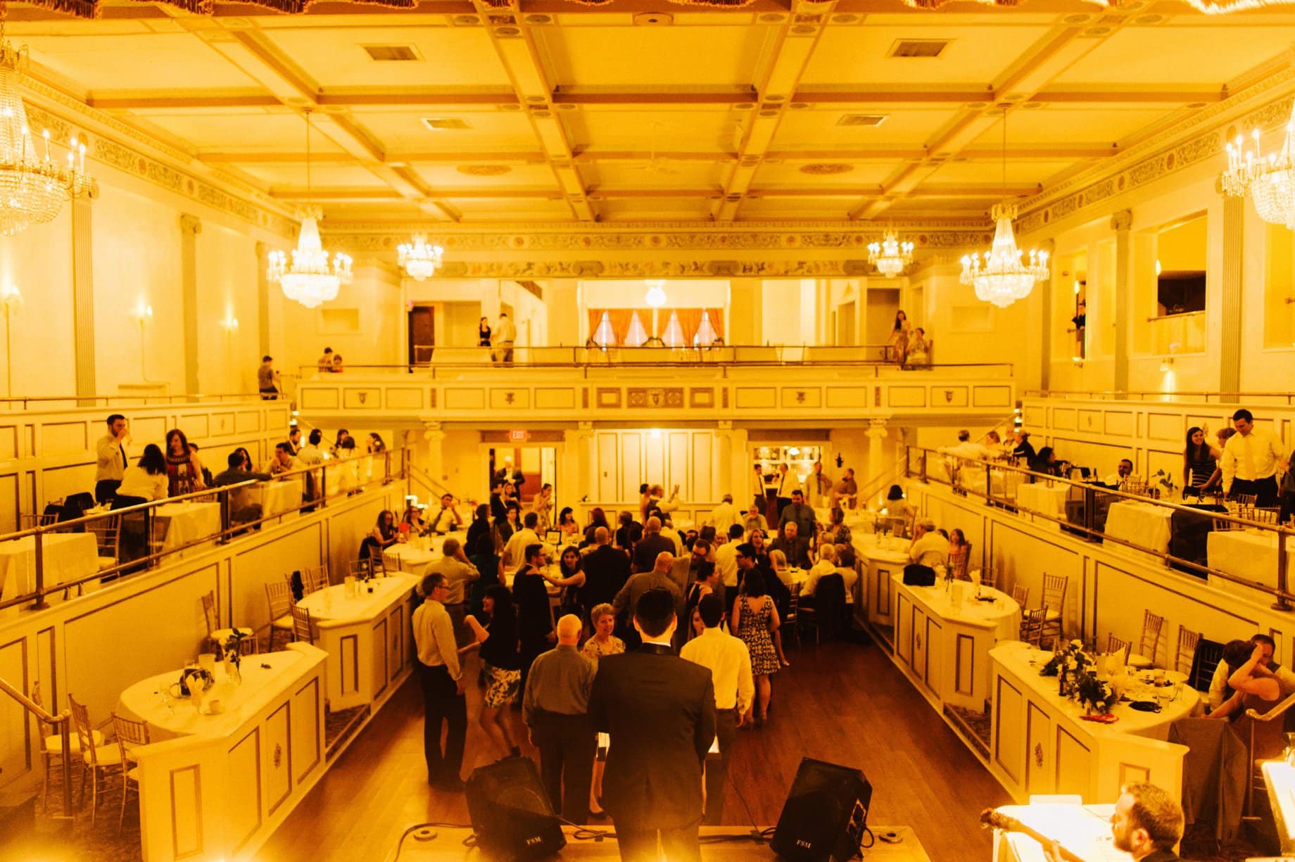 lots of action during wedding reception at the crystal ballroom of the lafayette grande ballroom