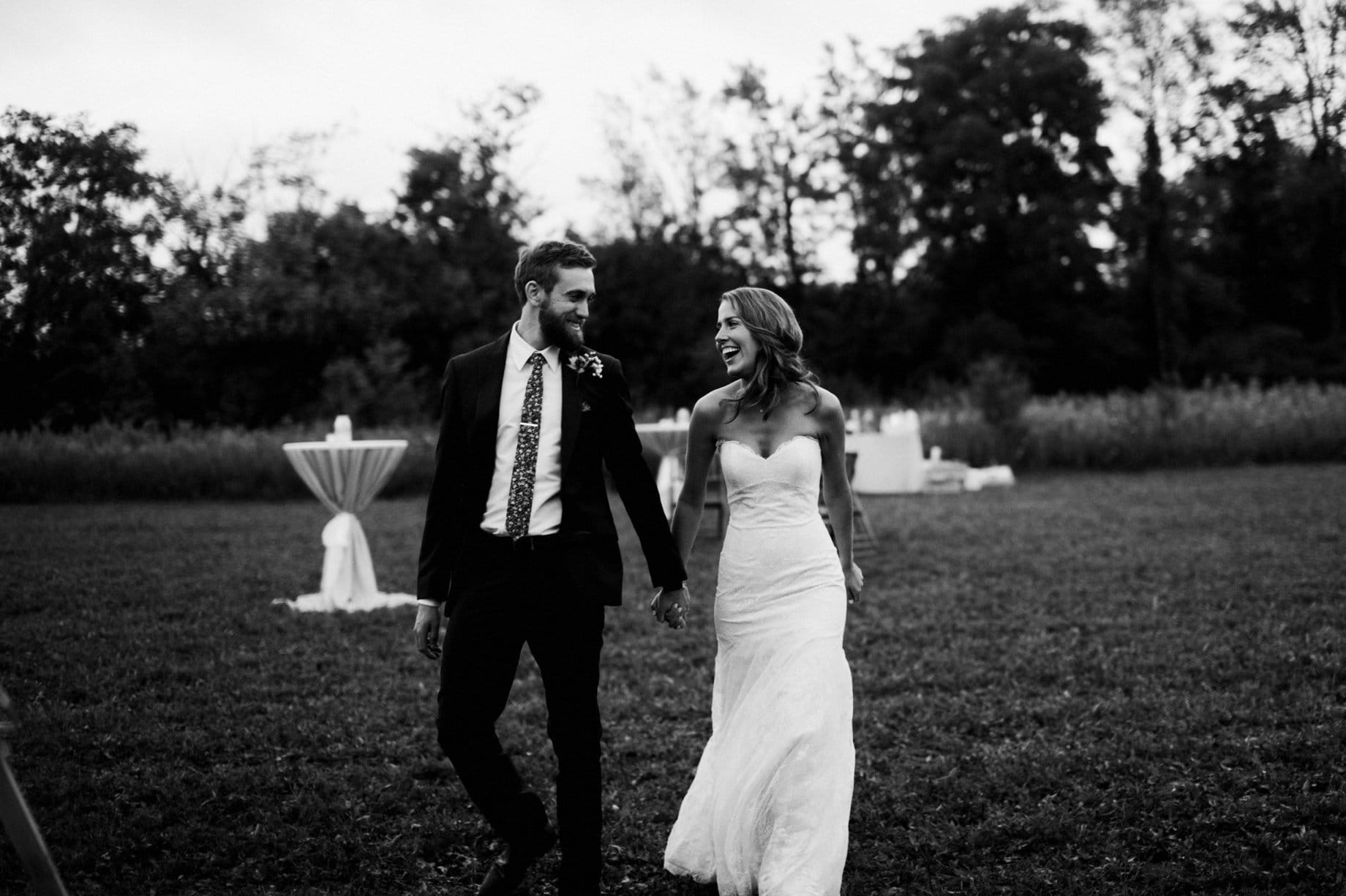 bride and groom entering reception