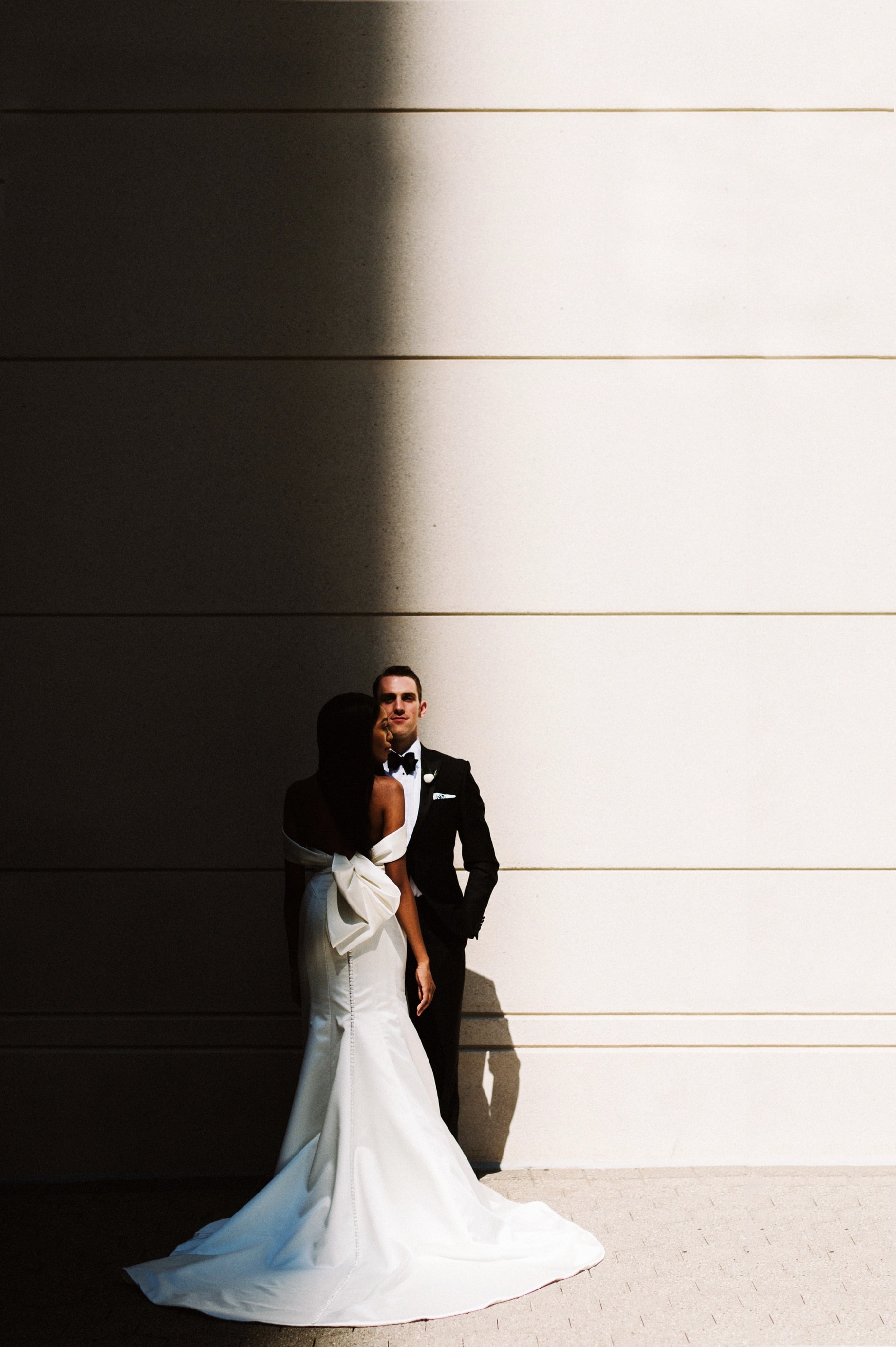 dramatic lighting bride and groom portrait