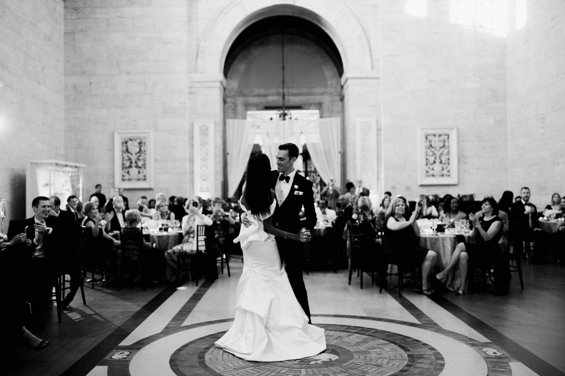 bride and groom share their first dance