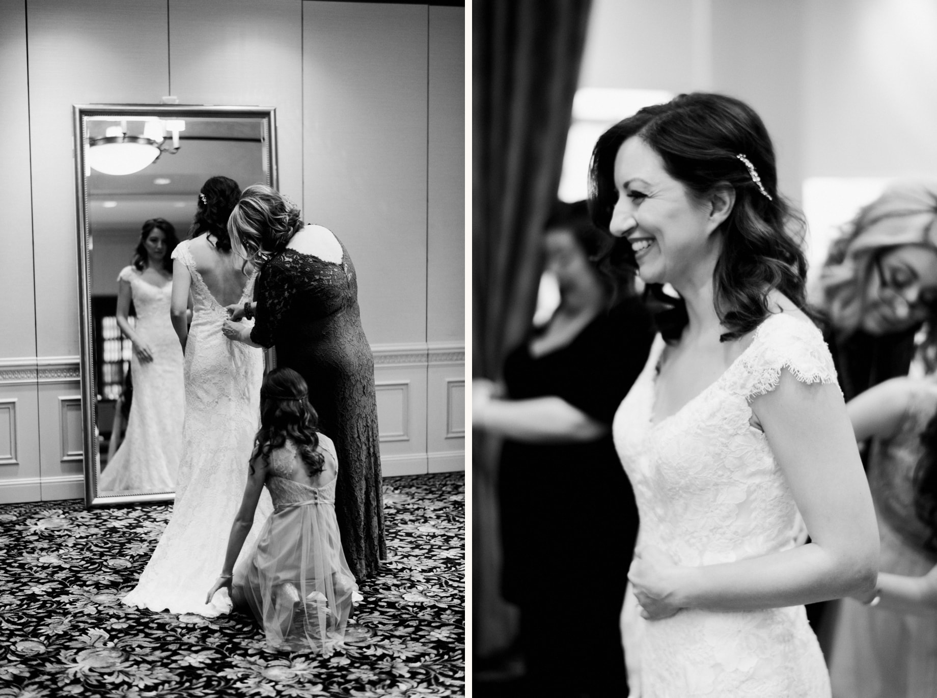 bride helped into her dress by her mother and daughter