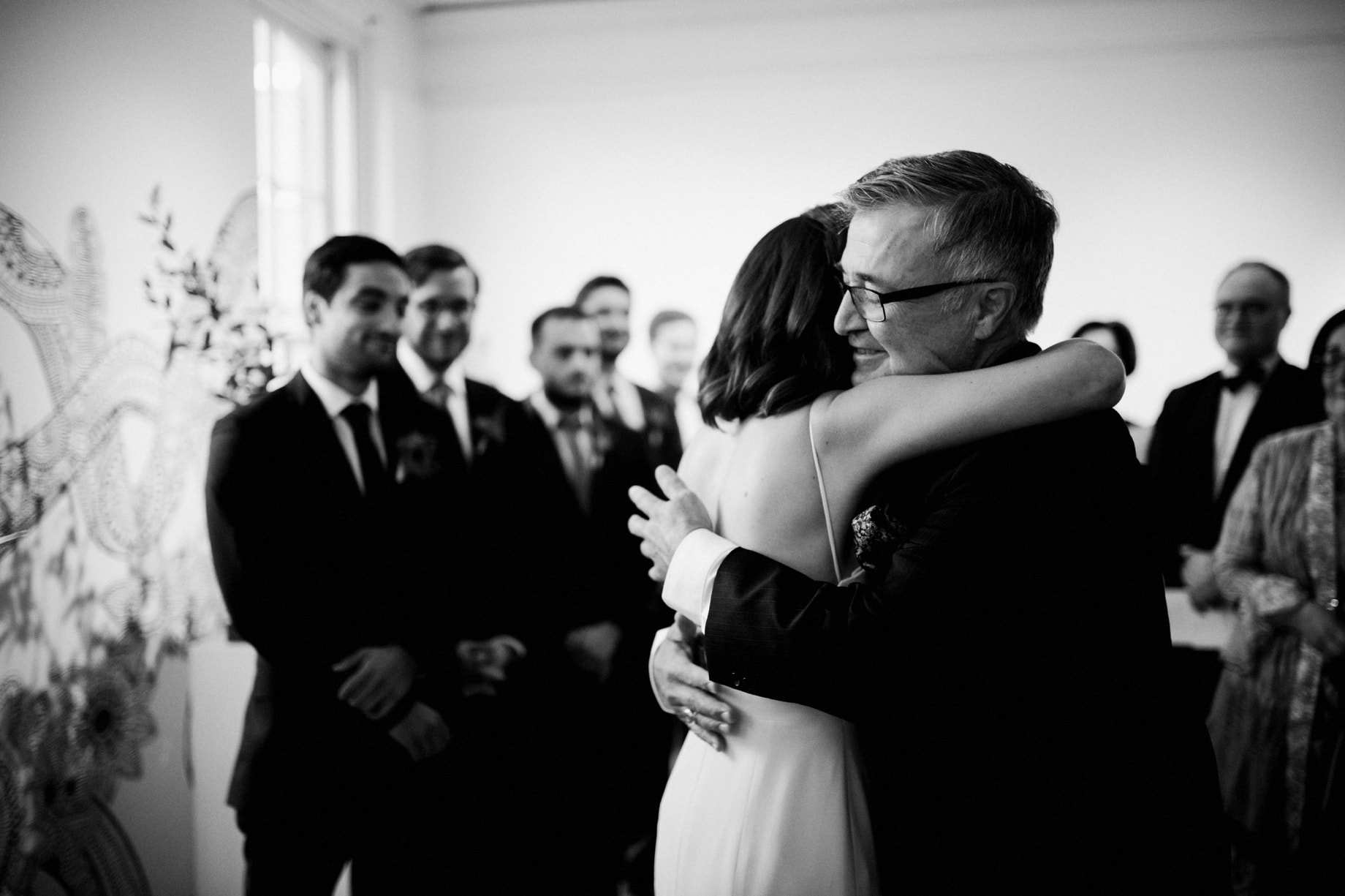 father of the bride giving away his daughter