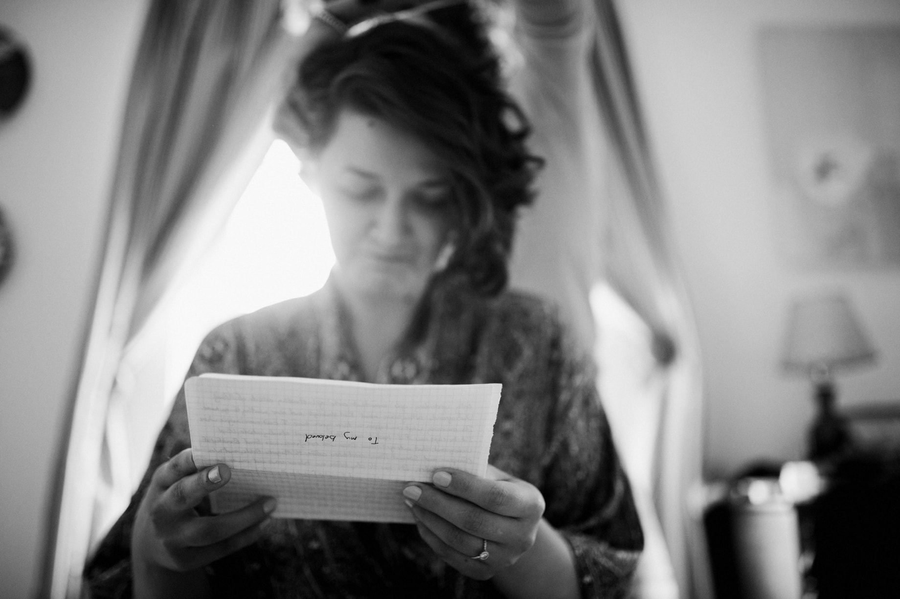 bride reading note from her groom