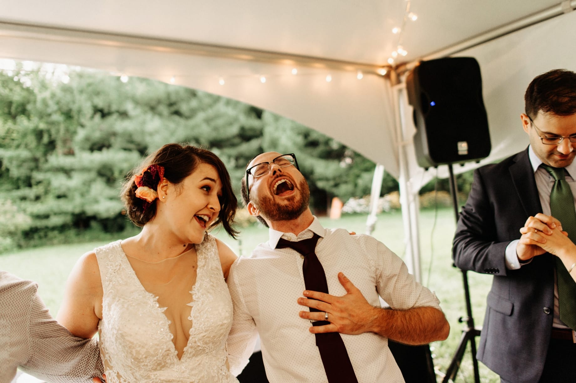 bride and groom singing along to songs