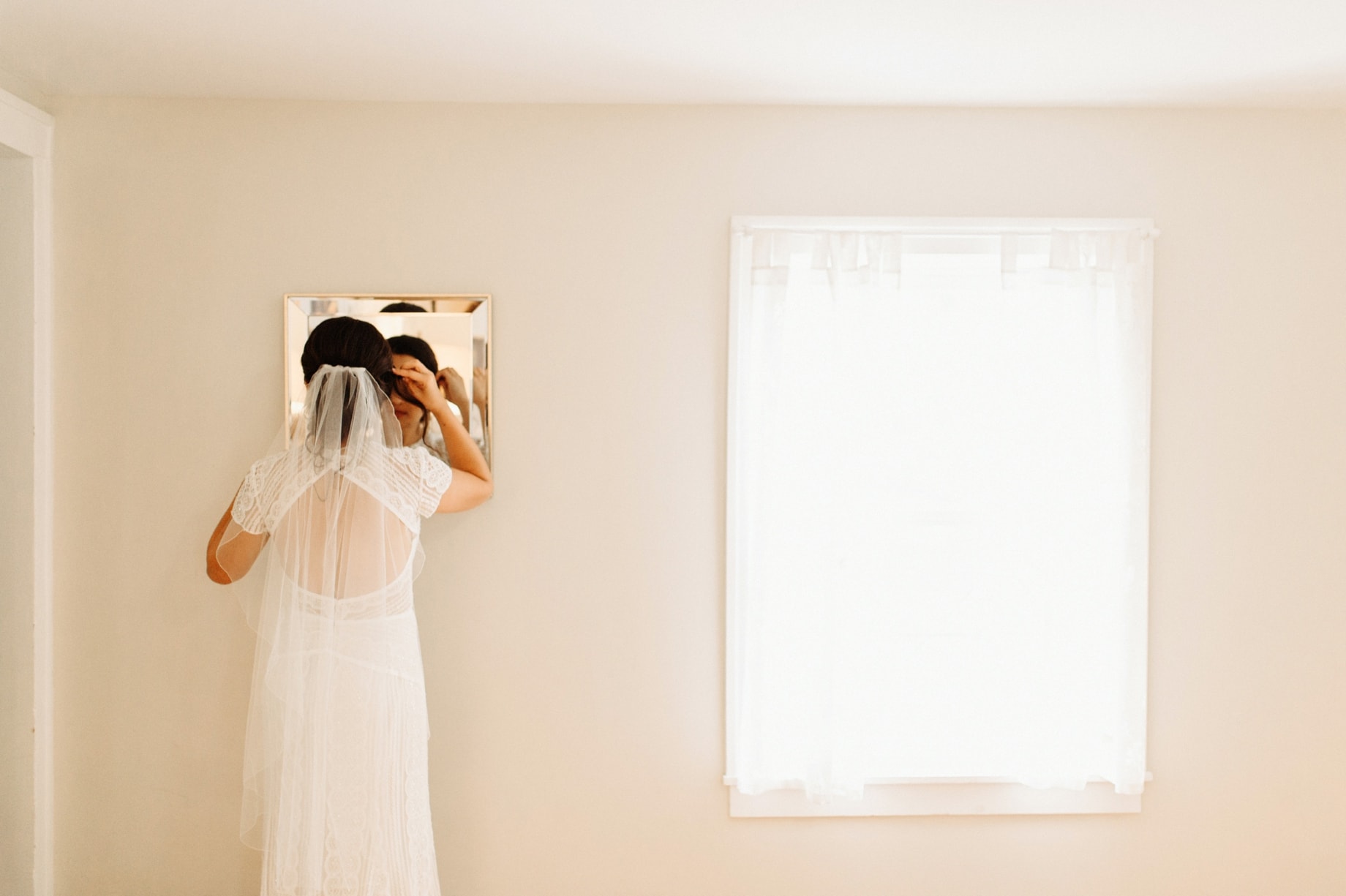 bride does finishing touches