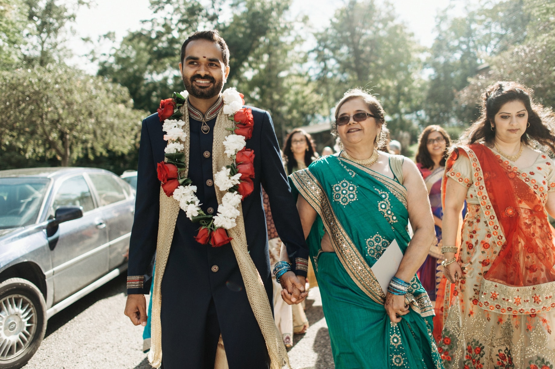 mother walkiing with son to his barat