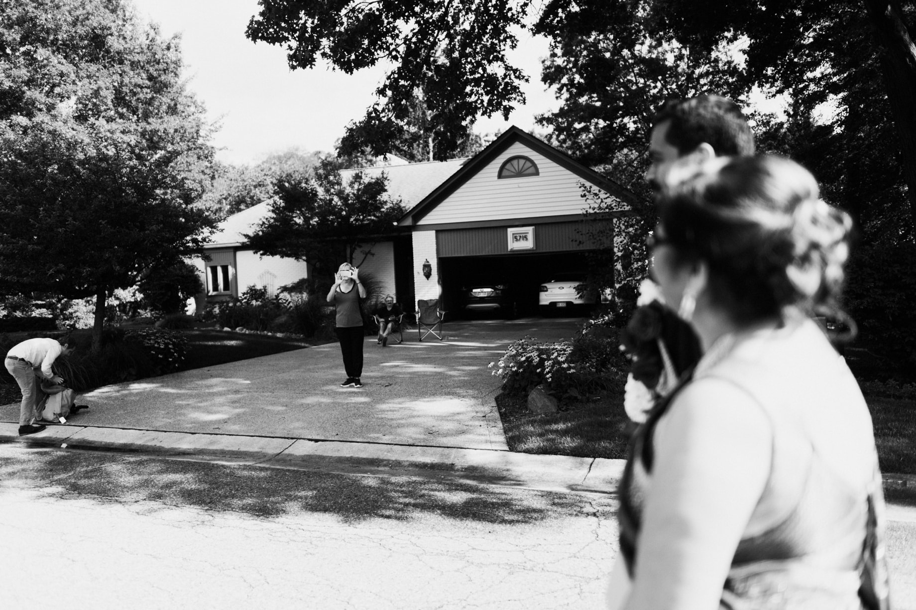 neighbors watch the barat processional