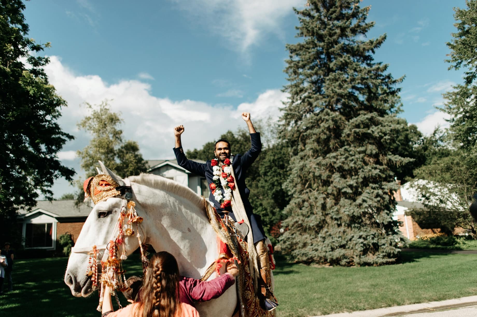 groom on white horse for his barat