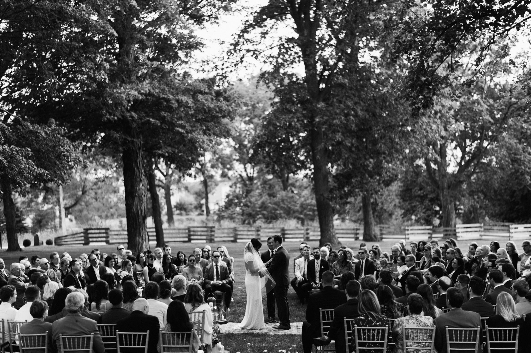 black and white photo of wedding ceremony at cornman farms