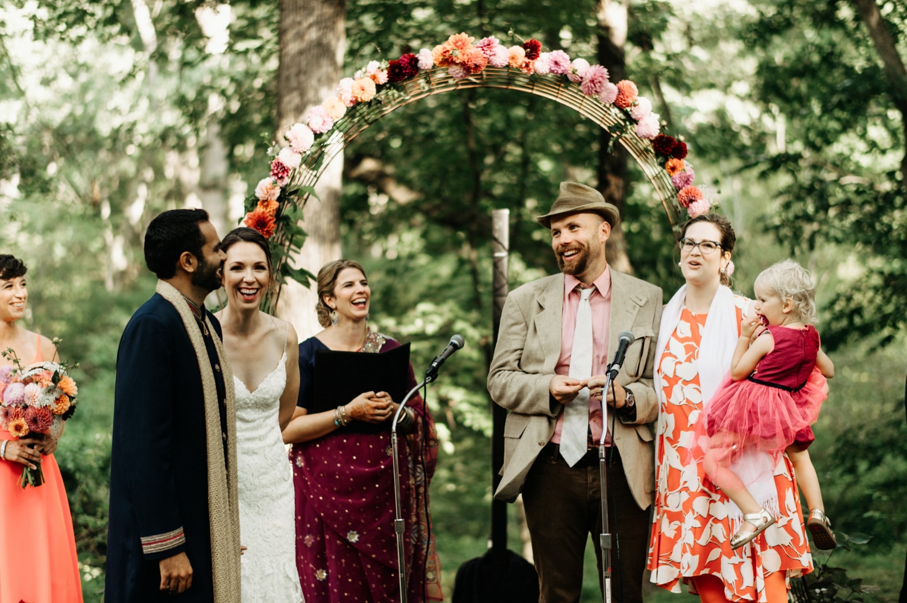 family members sharing marriage advice during an inter cultural wedding ceremony