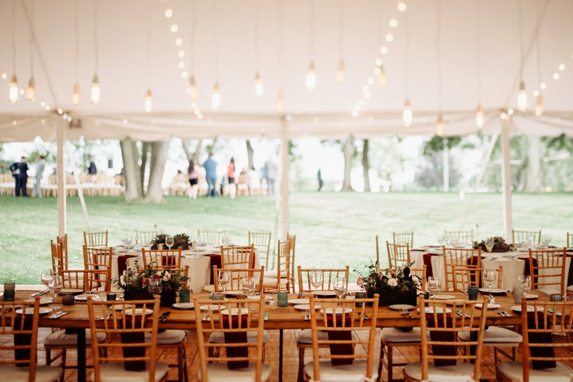 industrial lighting with wood farm tables