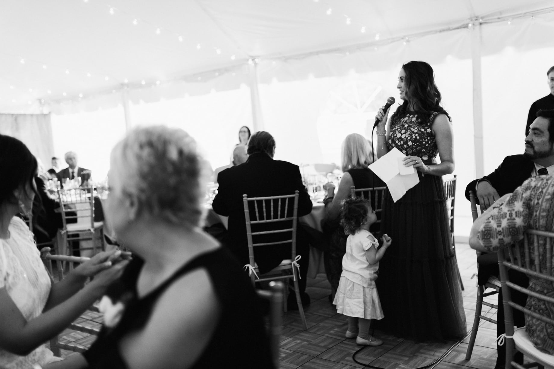 sister of the groom gives a speech with her daughter