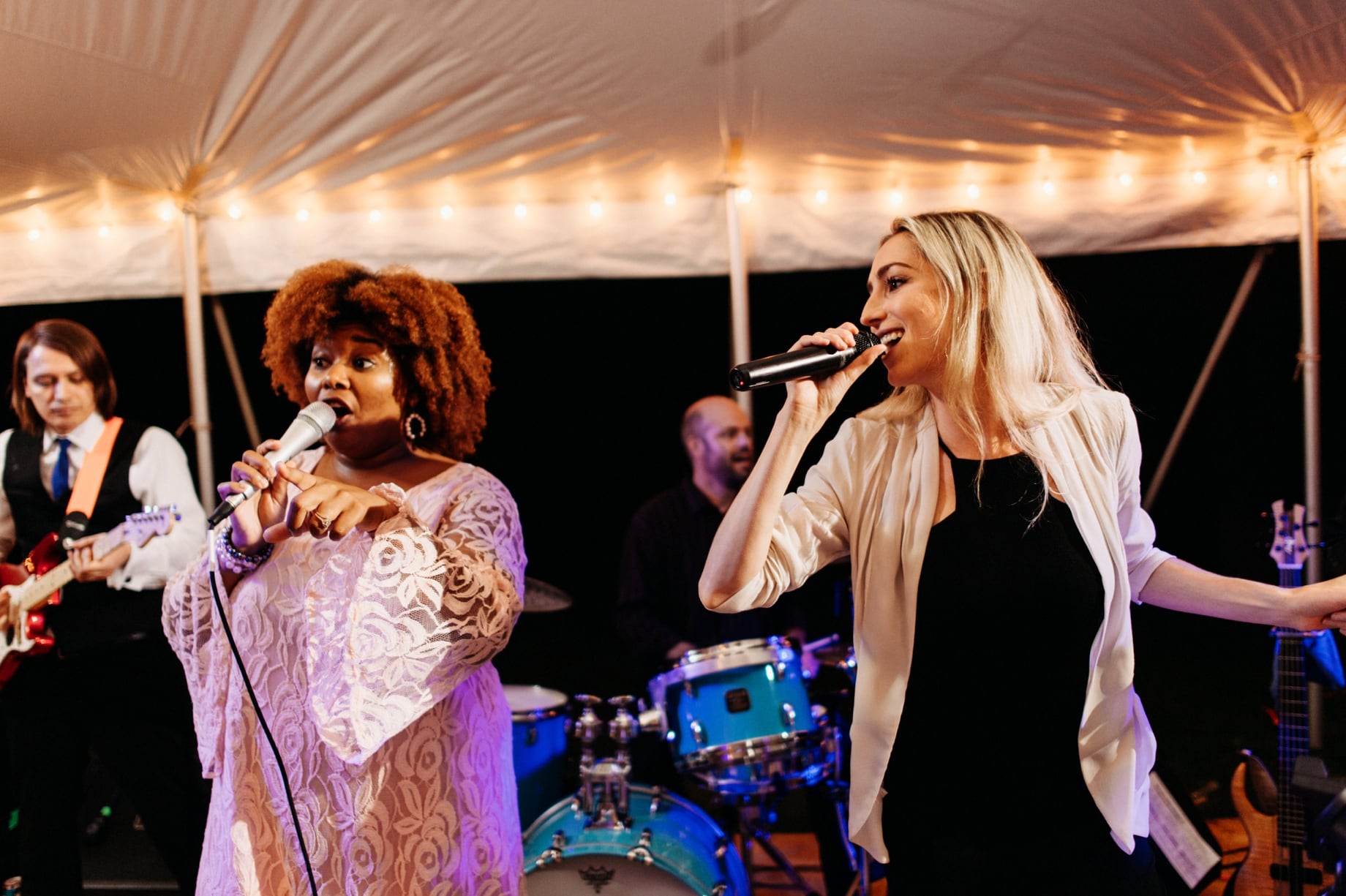 live band performs at a bloomfield hills backyard wedding