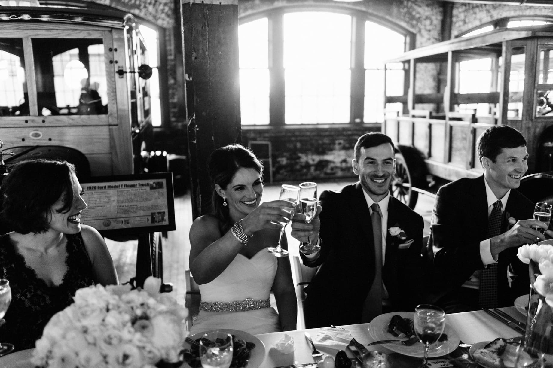 bride and groom toasting with champagne
