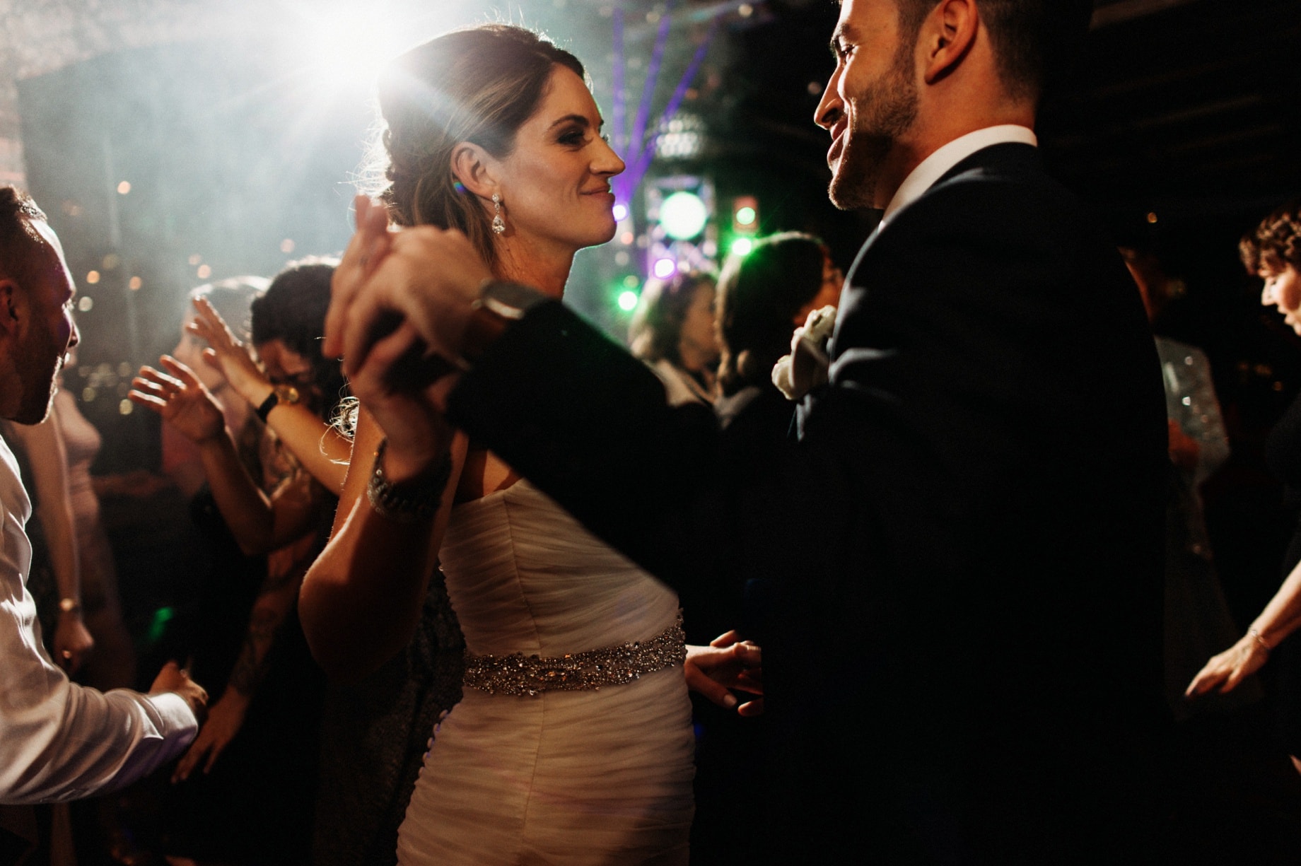 bride and groom dancing at their wedding in the Ford Piquette Plant by Detroit Wedding photographer Heather Jowett