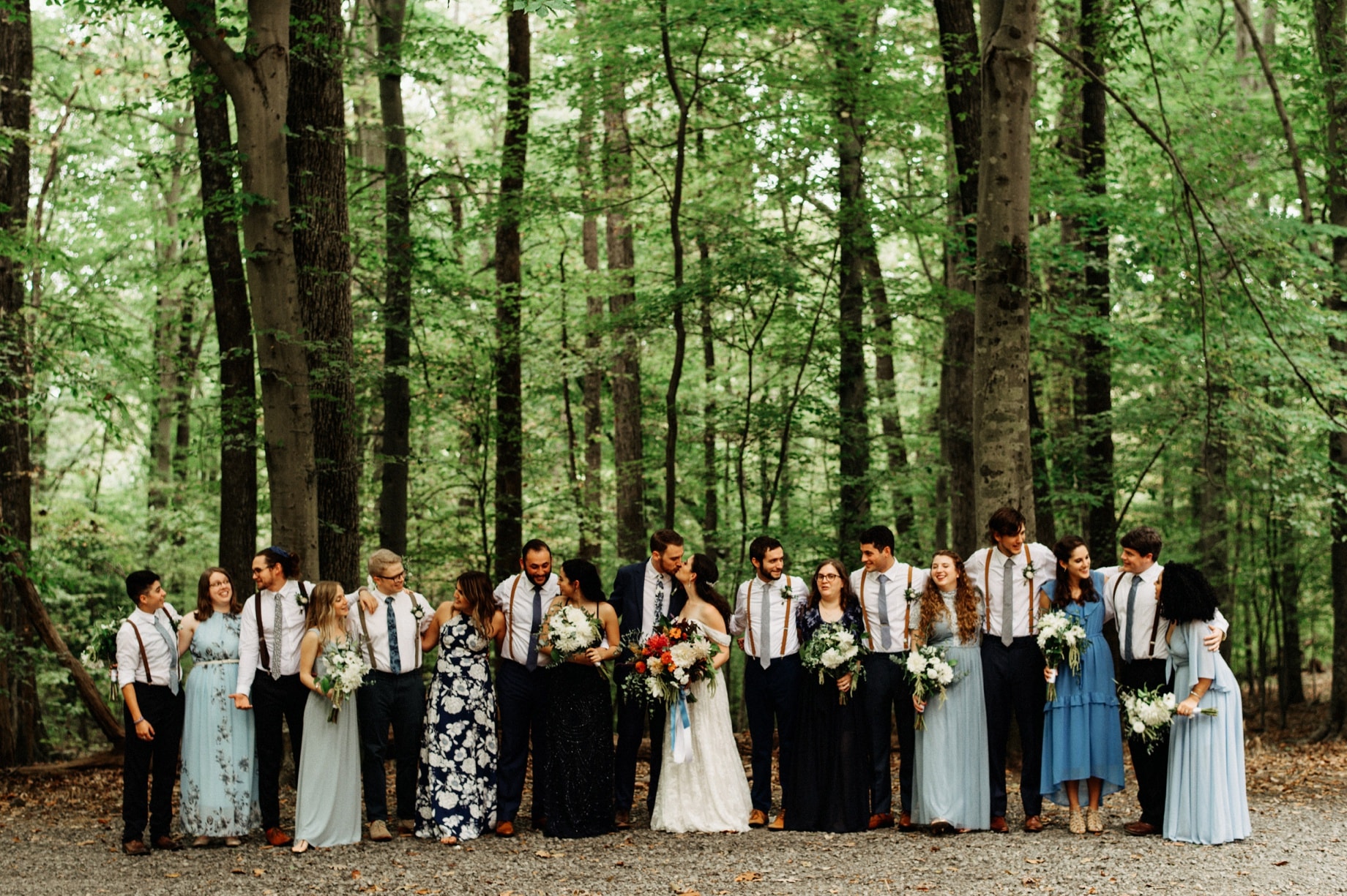 hipster wedding party in shades of blue and florals