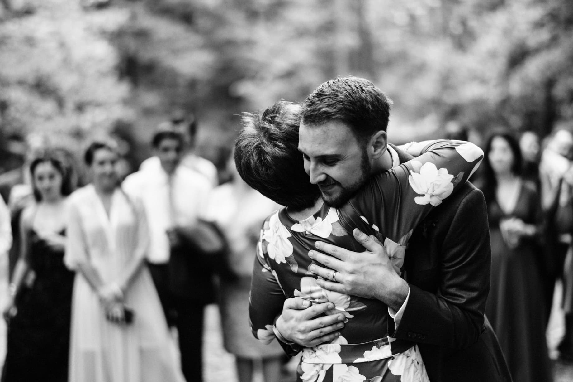 groom hugging his mother