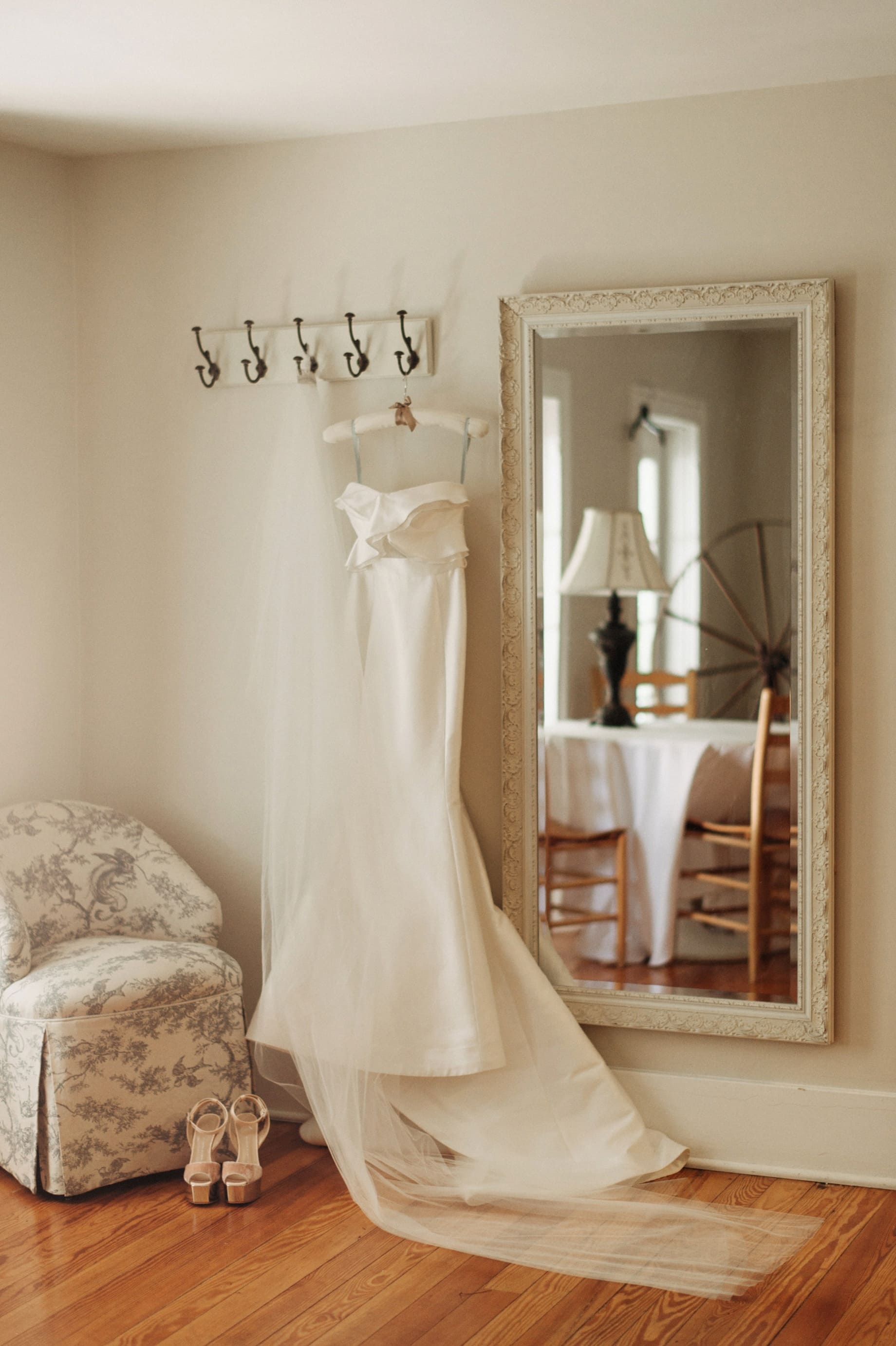 wedding dress hangs in the bridal suite at cornman farms