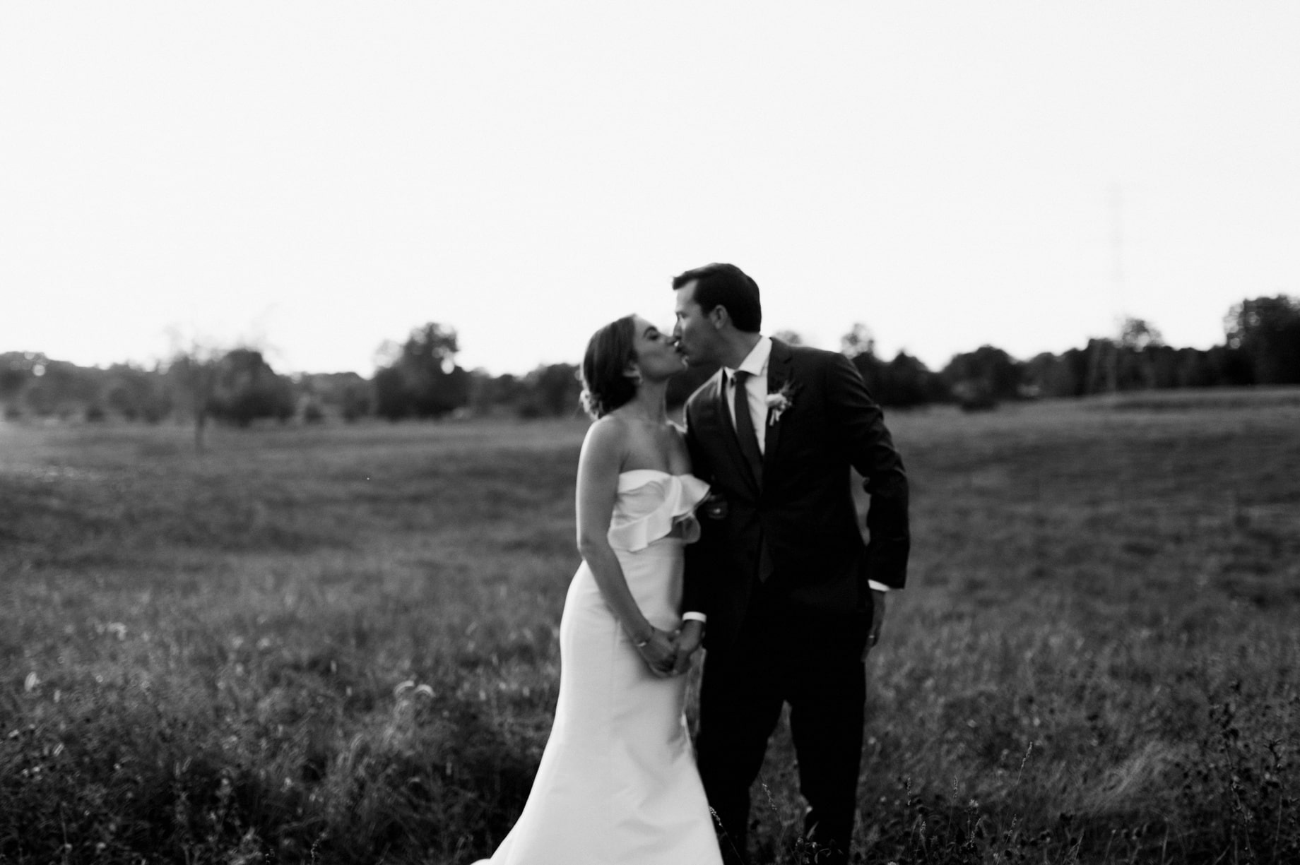 bride and groom take a moment away for golden hour photos