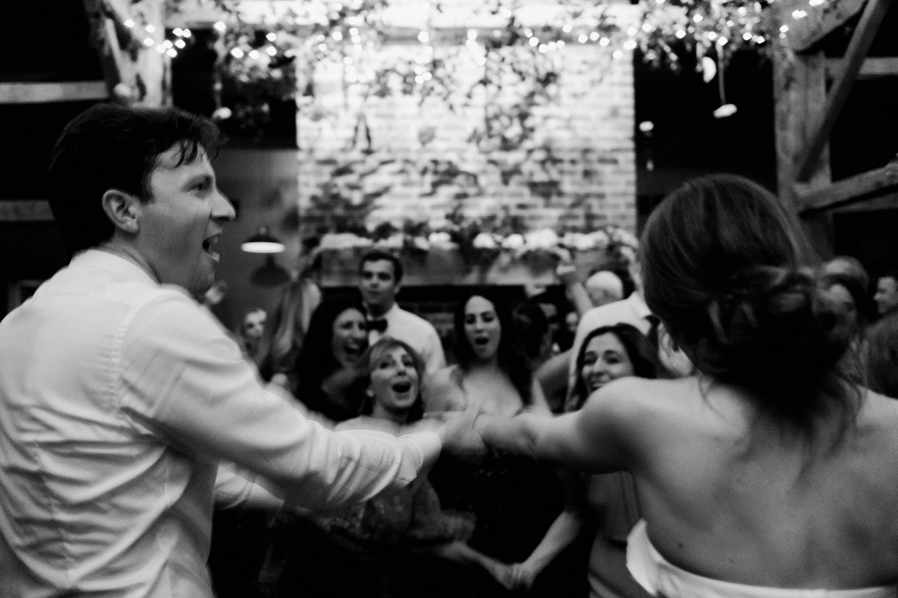 bride and groom enjoying their reception at cornman farms