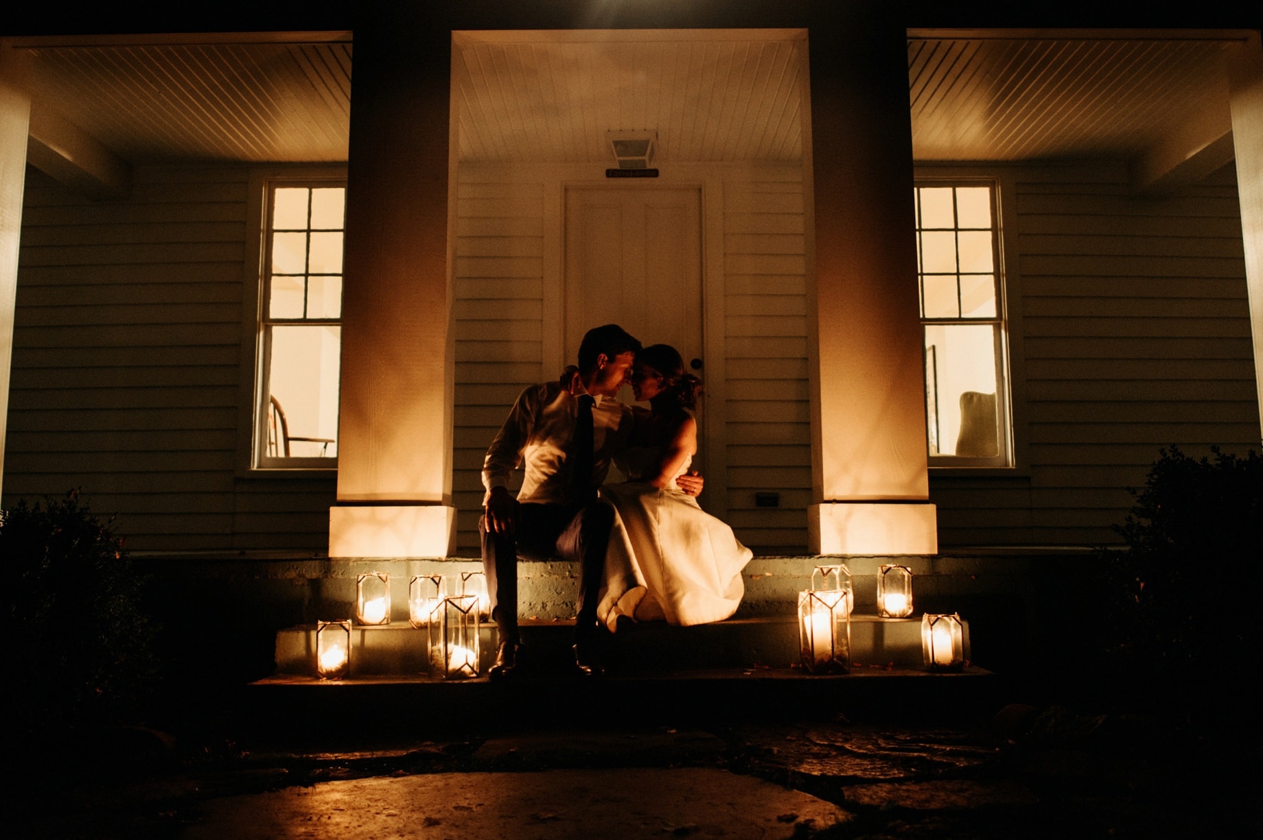 night portrait on the porch of the farmhouse at cornman farms