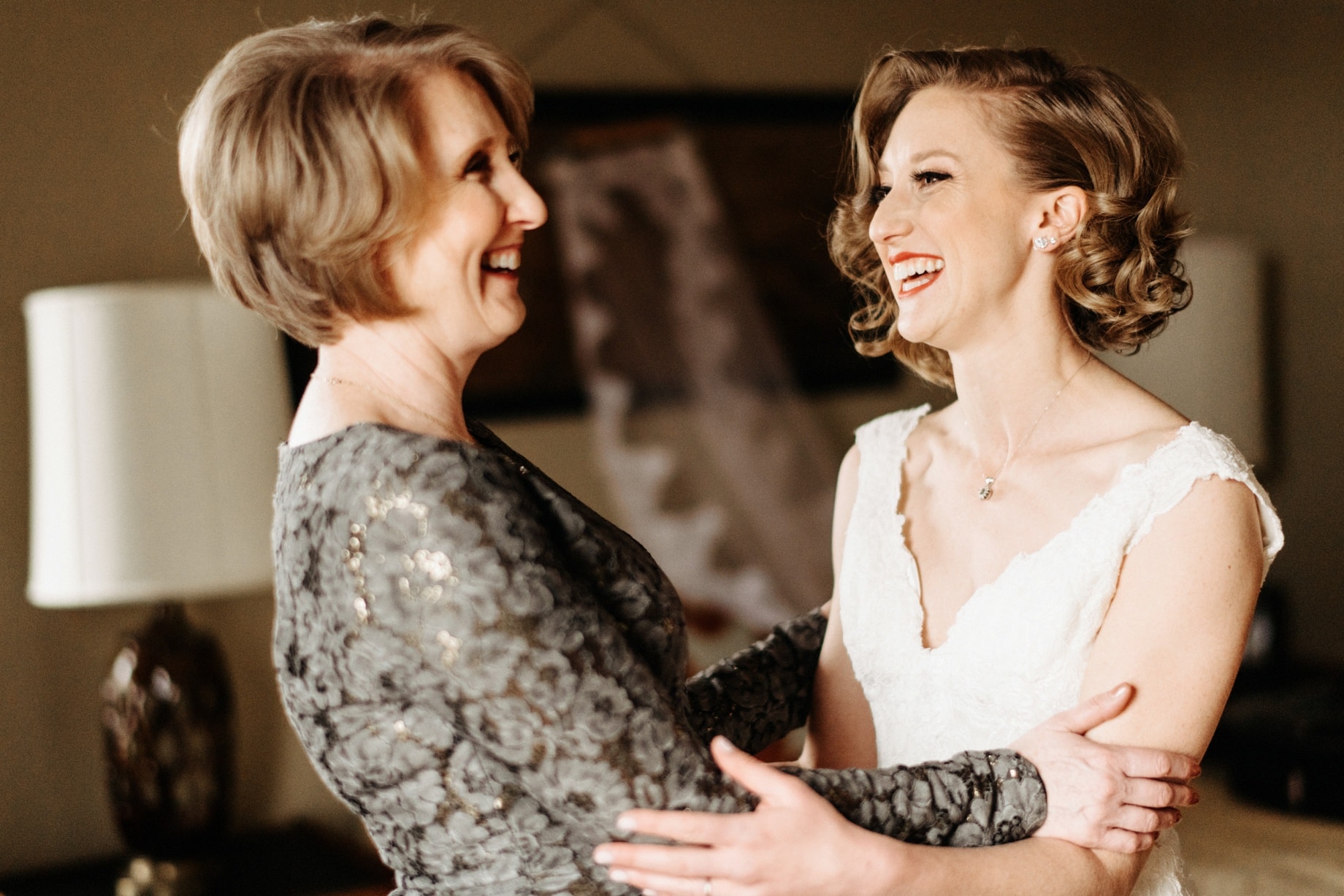 a bride and her mother share a special moment