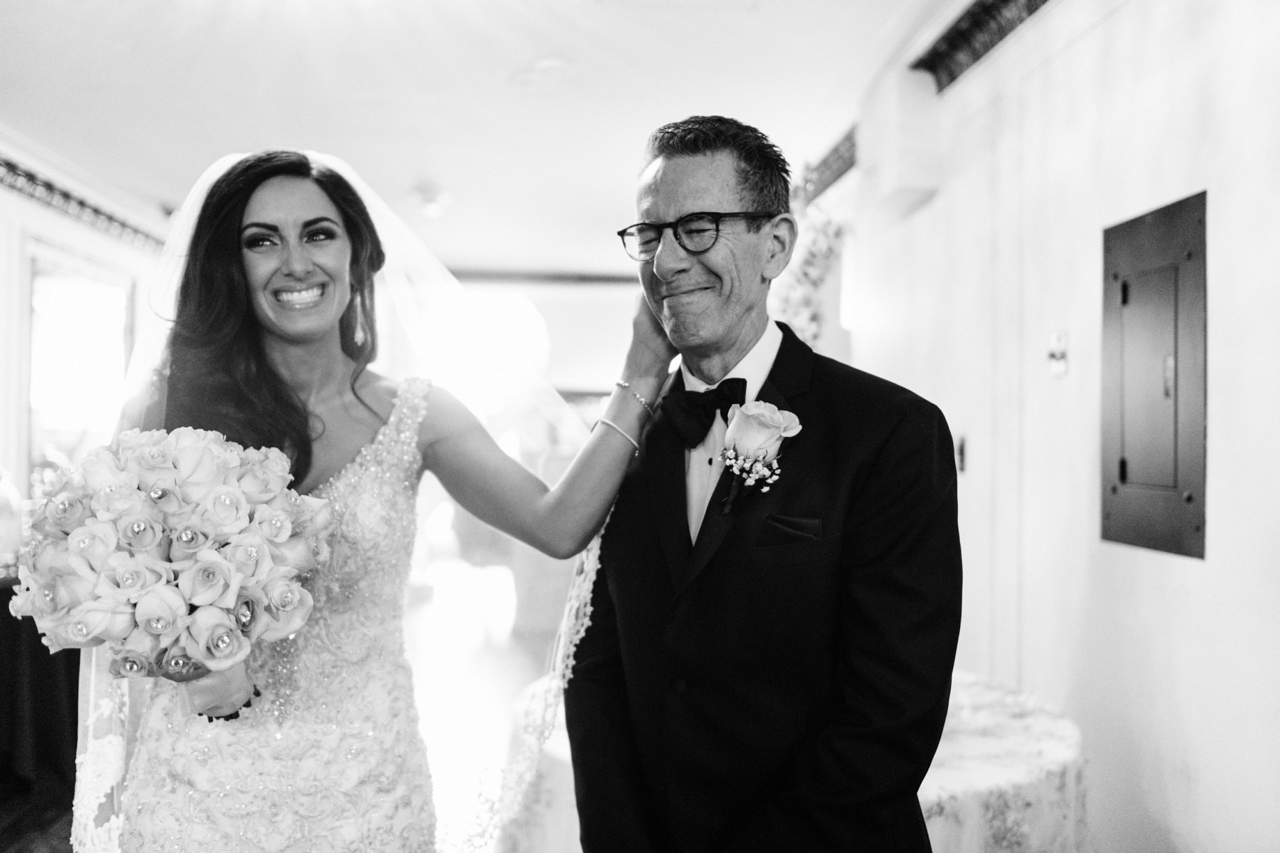 father of the bride gets emotional before walking his daughter down the aisle