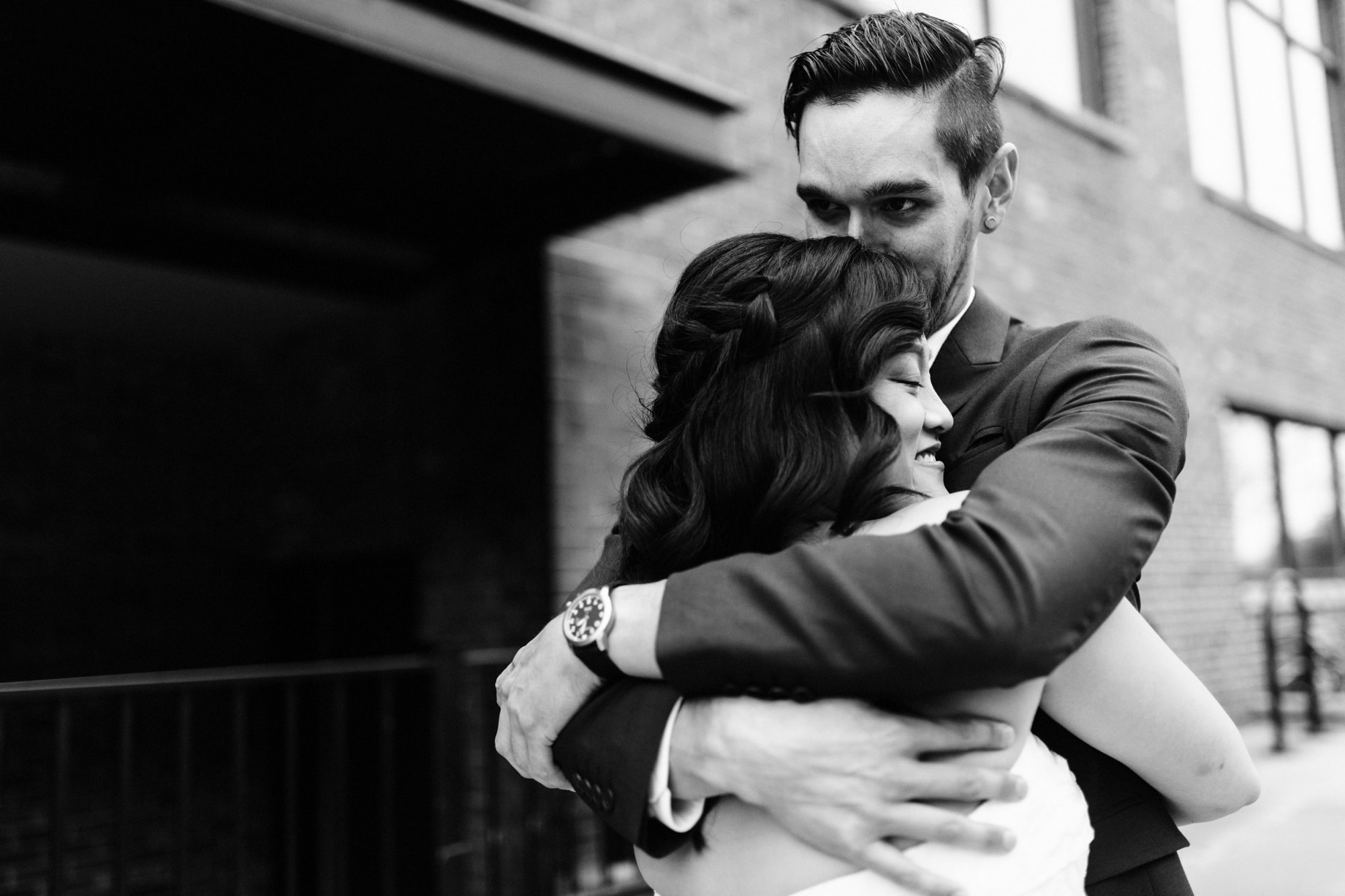 a couple embraces after their first look