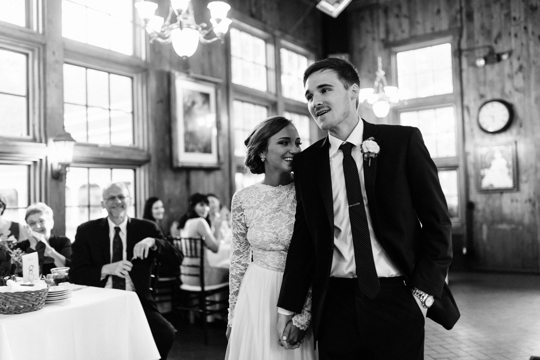 bride and groom entering the reception