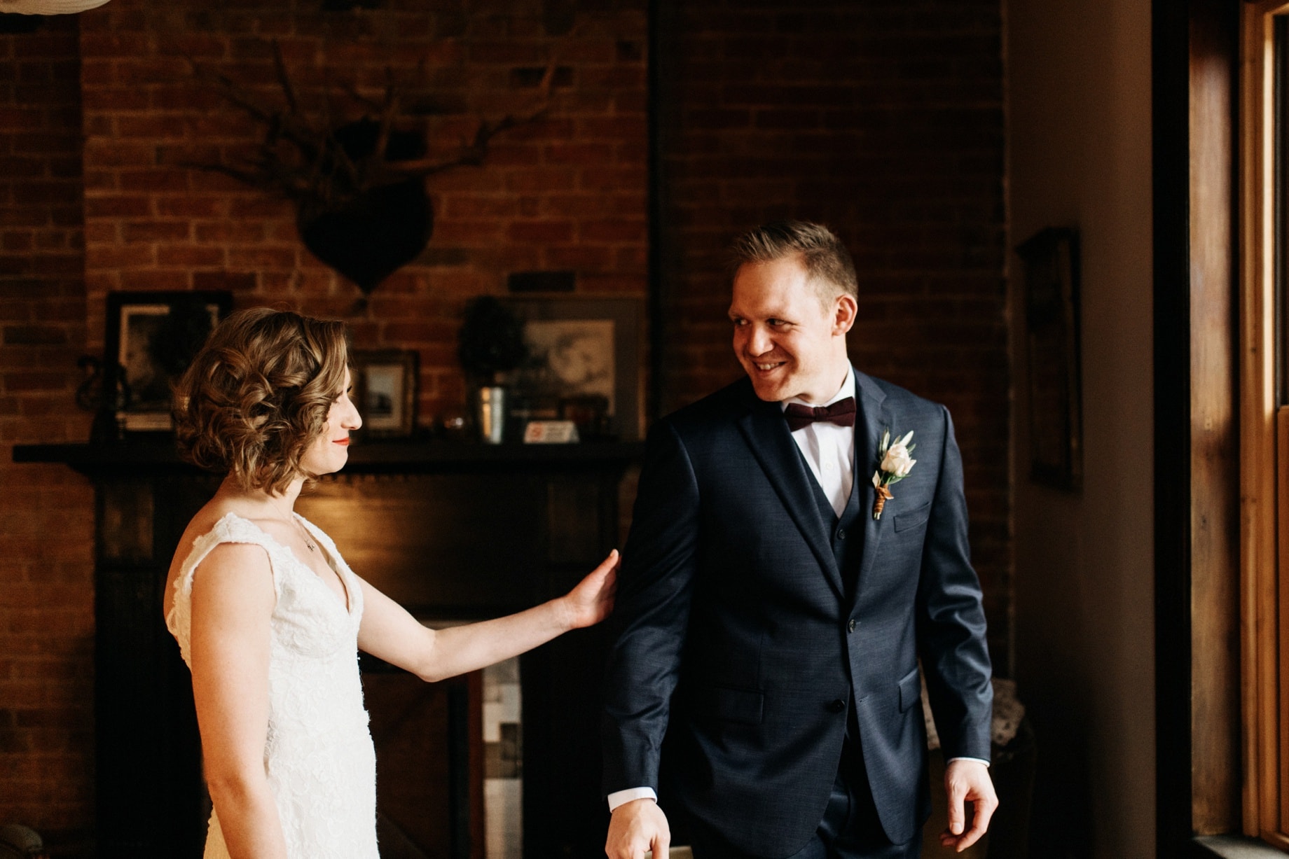 bride and groom share a first look before their detroit wedding by wedding photographer Heather Jowett