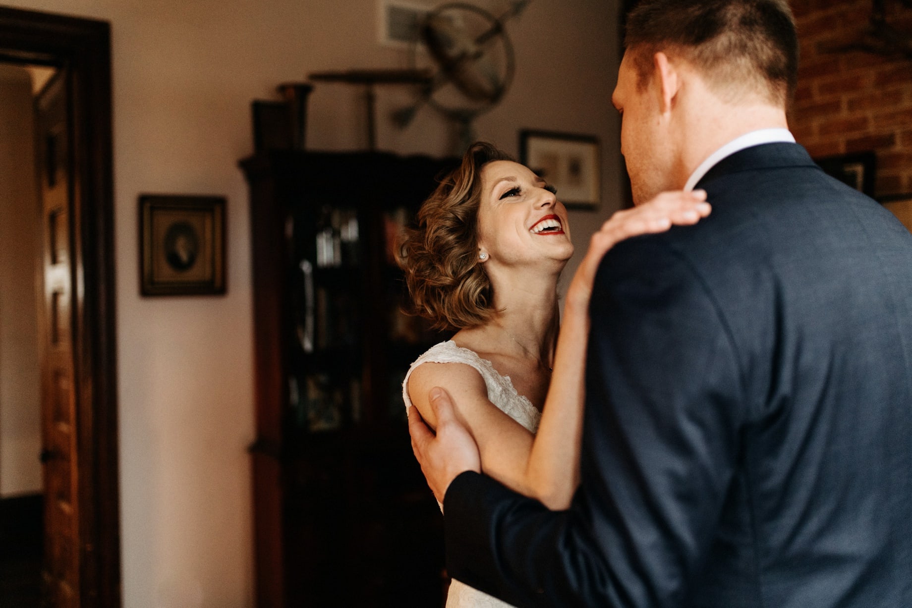 bride smiling at her groom