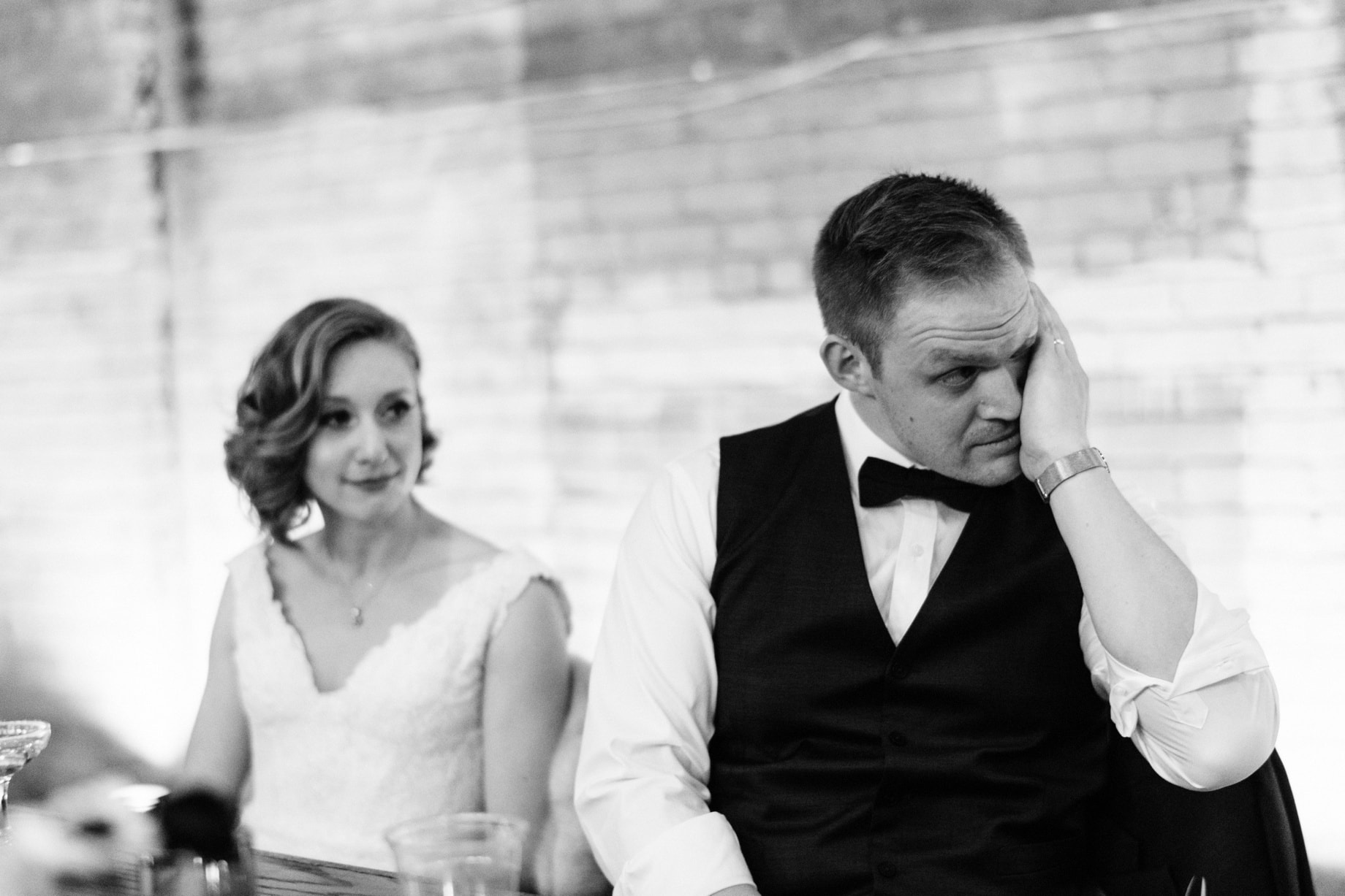 groom wipes away a year during his sisters speech