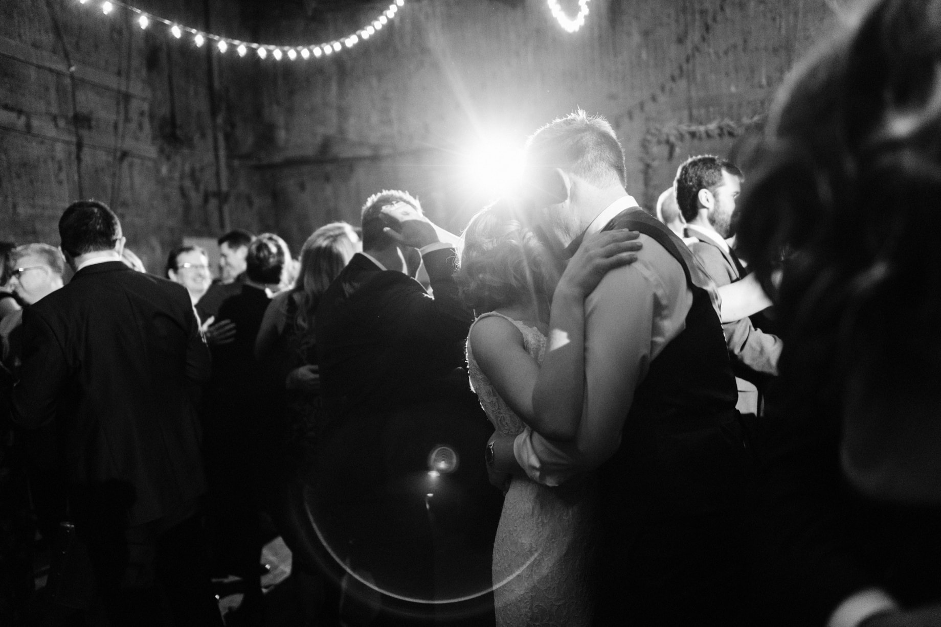 bride and groom dancing with guests at their jam handy wedding