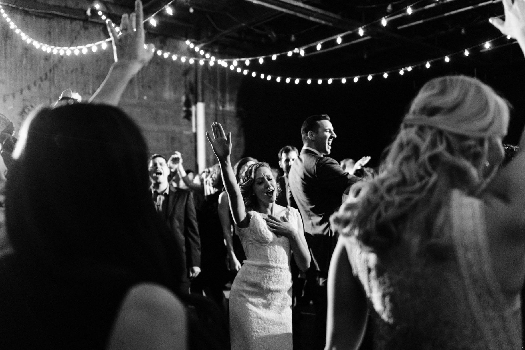 bride singing and dancing at her Jam handy wedding