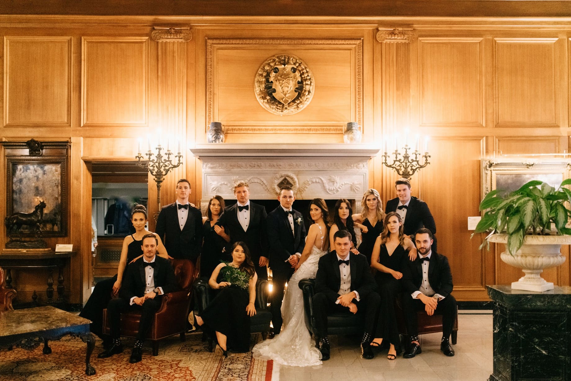 Wedding party poses at Detroit Athletic Club by Detroit wedding photographer Heather Jowett