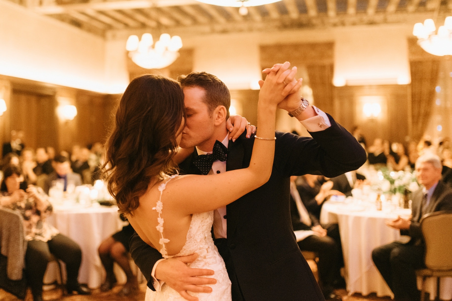 bride and groom sharing a first dance by Detroit wedding photographer Heather Jowett