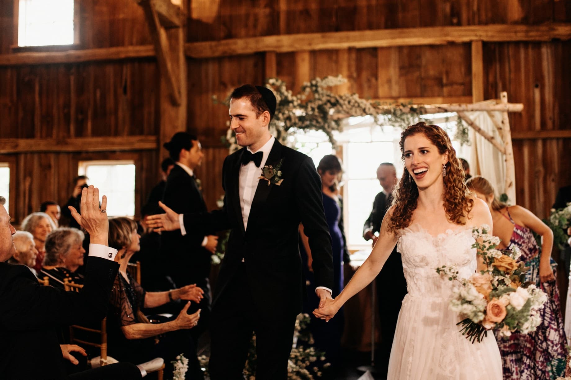 bride and groom recessing after ceremony